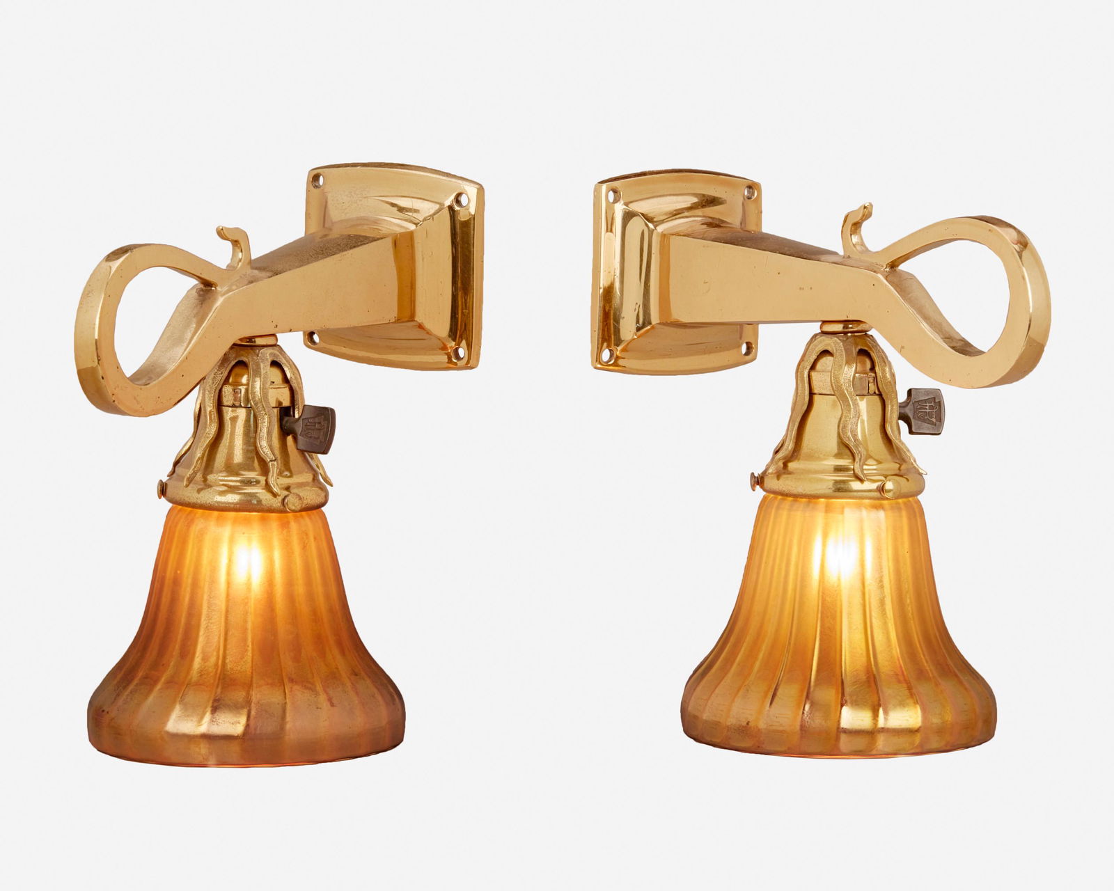 A pair of Arts and Crafts polished brass and glass (1 of 2)