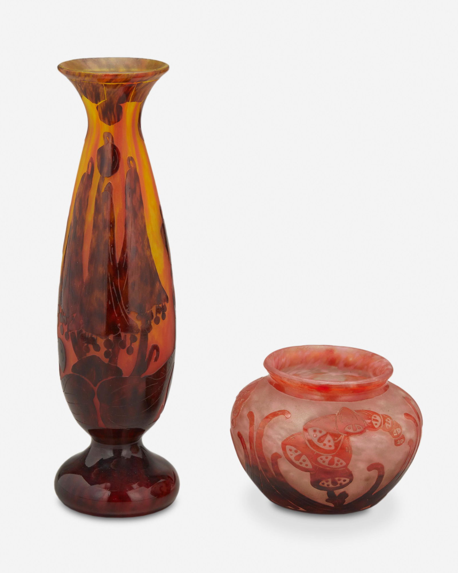 Two Charles Schneider Le Verre Francais glass vases: Circa 1918-1932; Epinay-sur-Seine, France Each signed: Le Verre Francais; One further signed: Charder Each acid-etched cameo glass, comprising one footed "Campanules" vase cut from mottled red to re