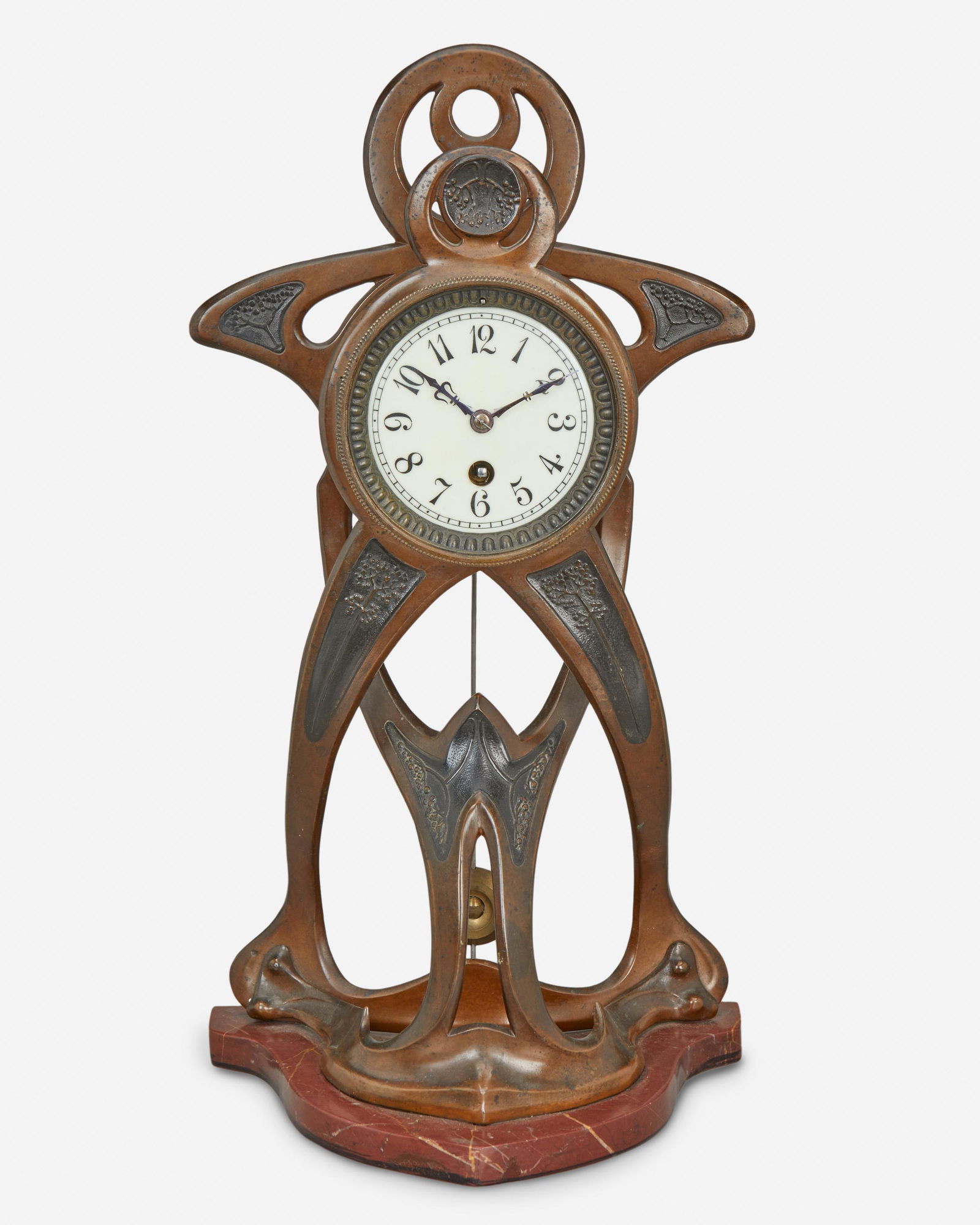 An Art Nouveau patinated metal clock (1 of 4)