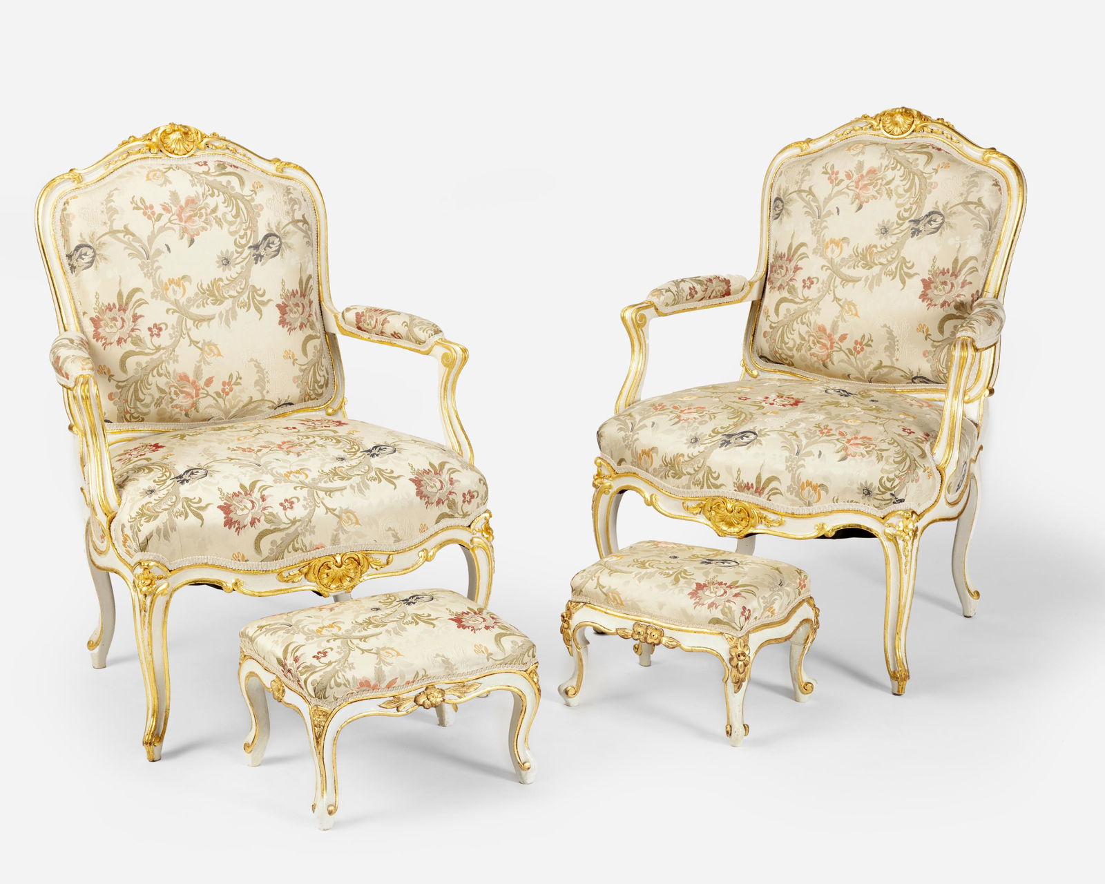 A pair of Louis XVI-style carved giltwood fauteuils (1 of 3)
