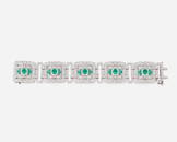 An Art Deco diamond and emerald bracelet