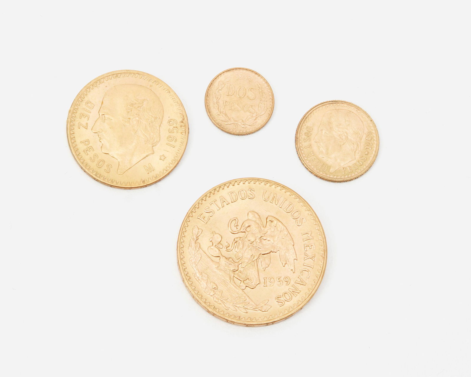 Four Mexican gold coins (1 of 2)