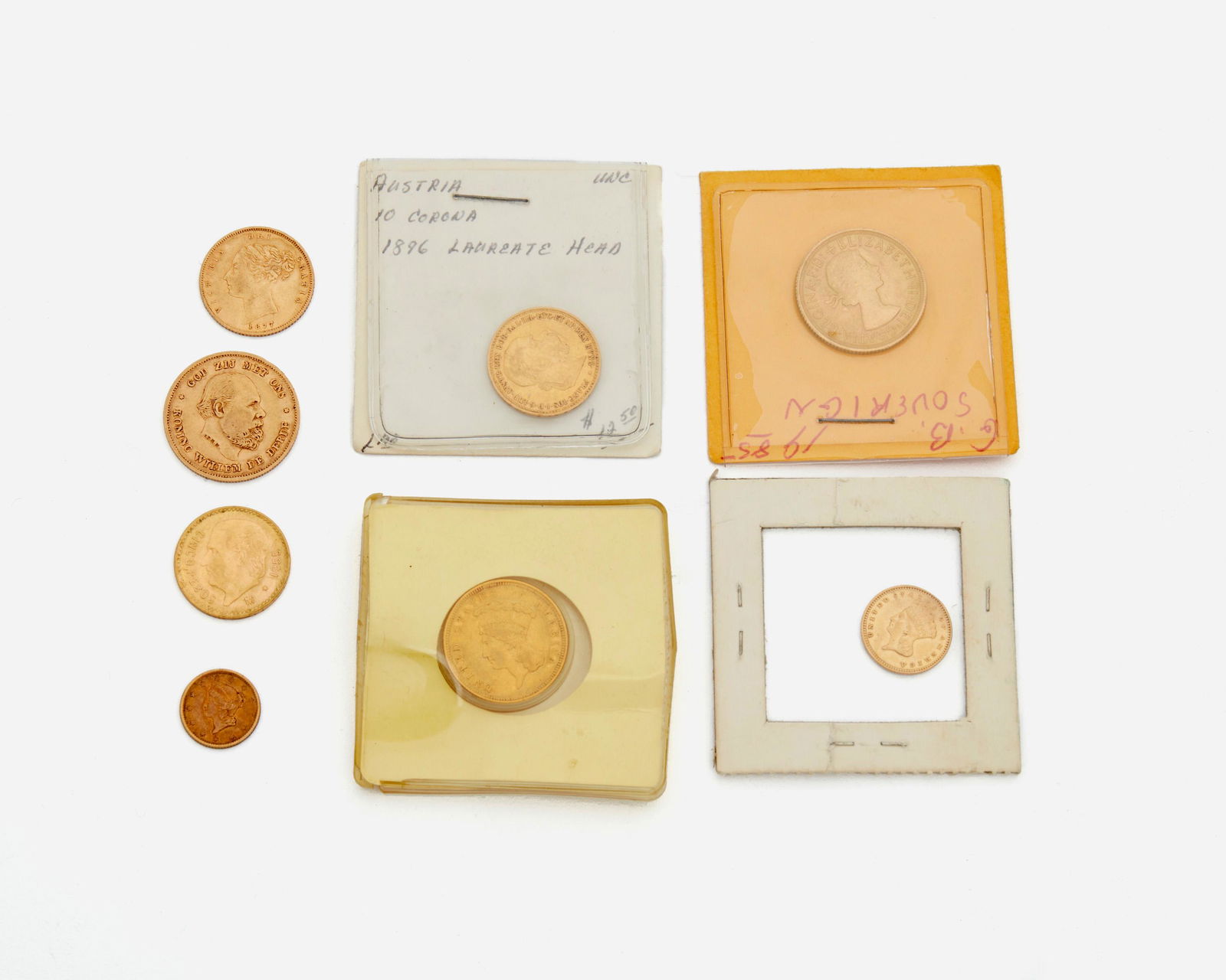 Seven various gold coins (1 of 2)