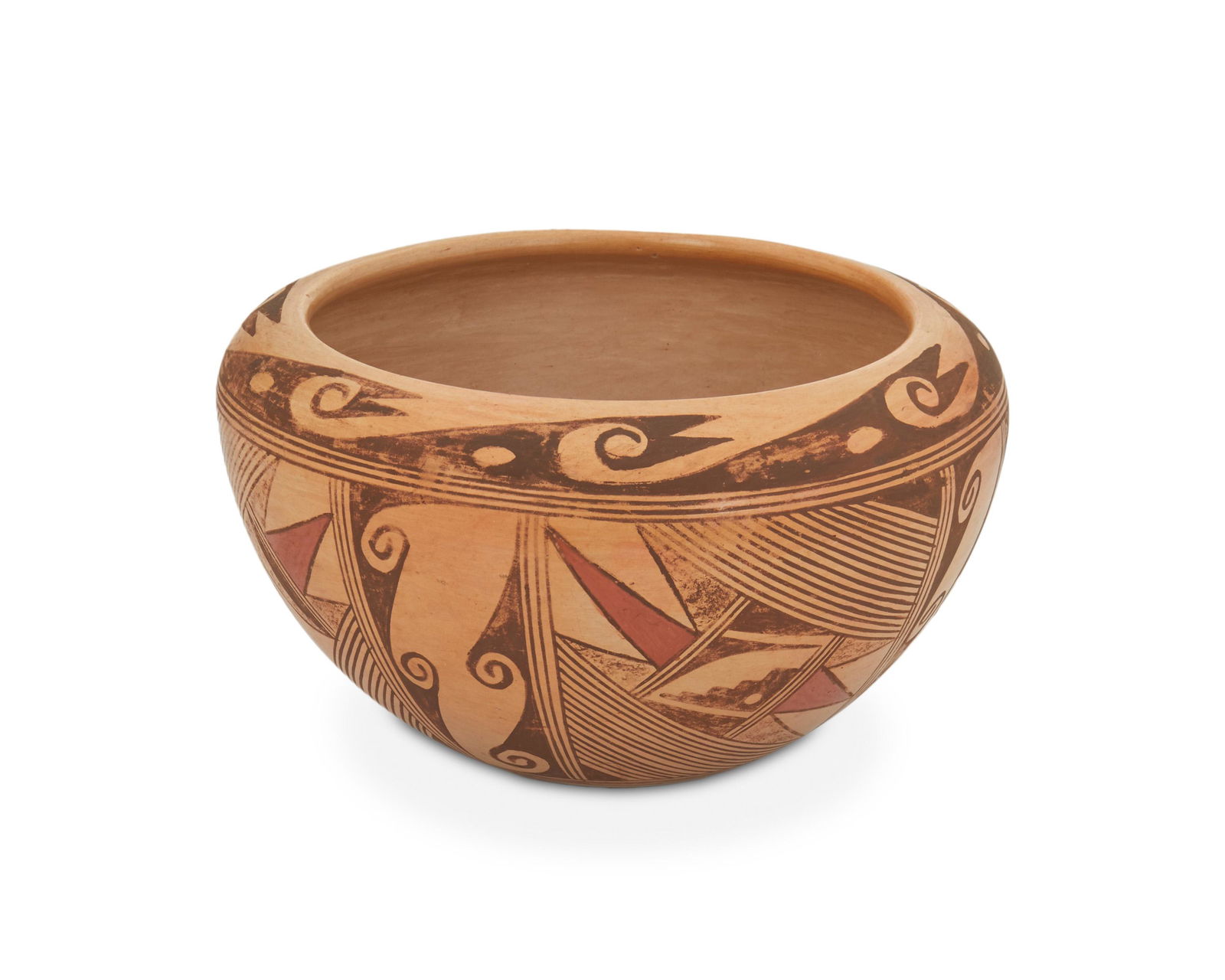 A Rondina Huma Hopi-Tewa pottery bowl: (b. 1947, Hopi-Tewa) Signed: Rondina Huma / Tewa Village The coil-built and stone-polished polychrome pottery bowl with red, cream, black repeating geometric, scrolled, and linear decoration 4.5" H