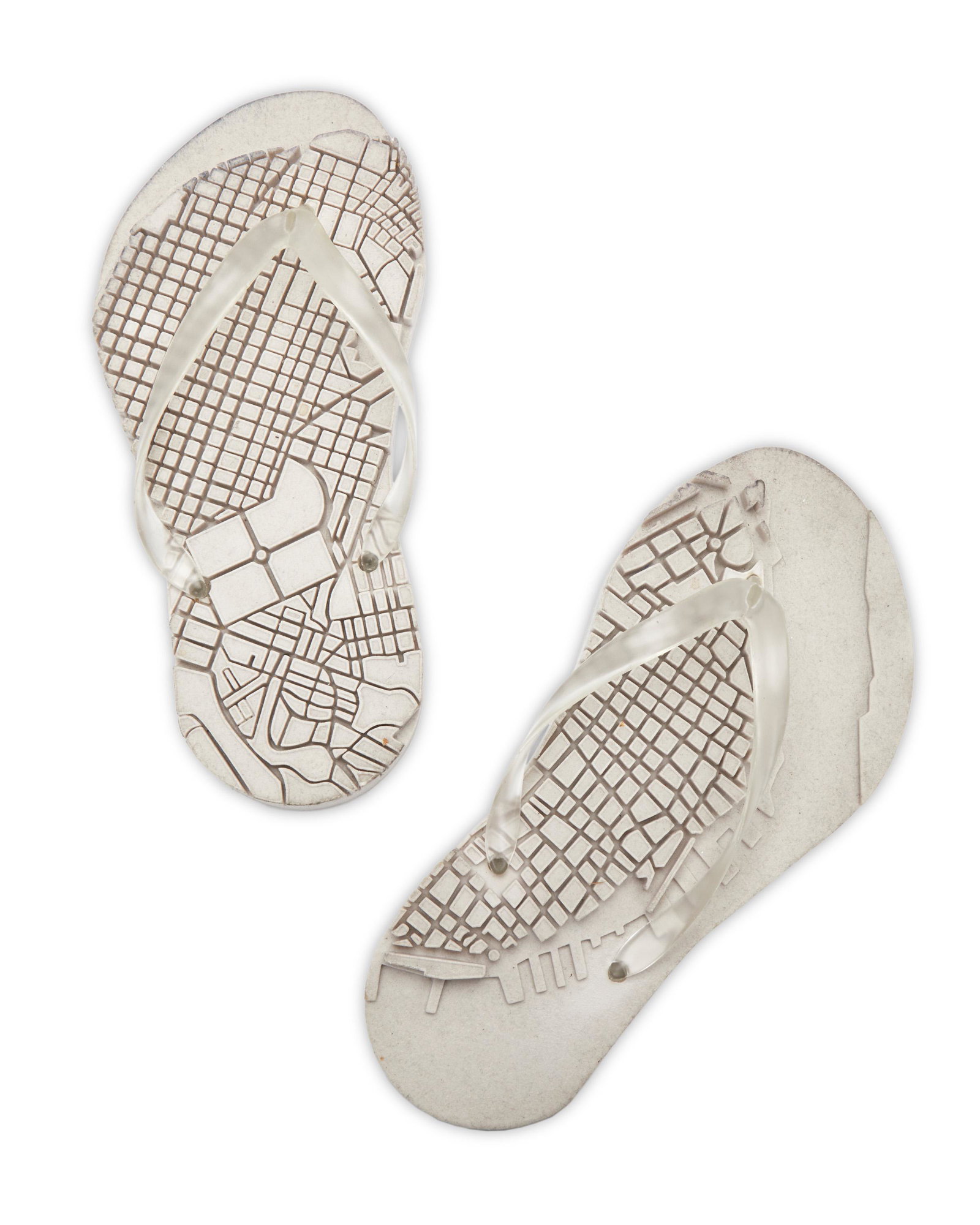 Los Carpinteros (Founded 1991, Cuban): "Sandalia," 2004 Cast rubber Edition 53/60; signed and dated: Habana / Los Carpinteros / Grahpicstudios / GS 1402 / 2004 Each: 12.75" H x 5.75" W x 2.75" D Provenance: Sale: In Situ, Paris, Franc