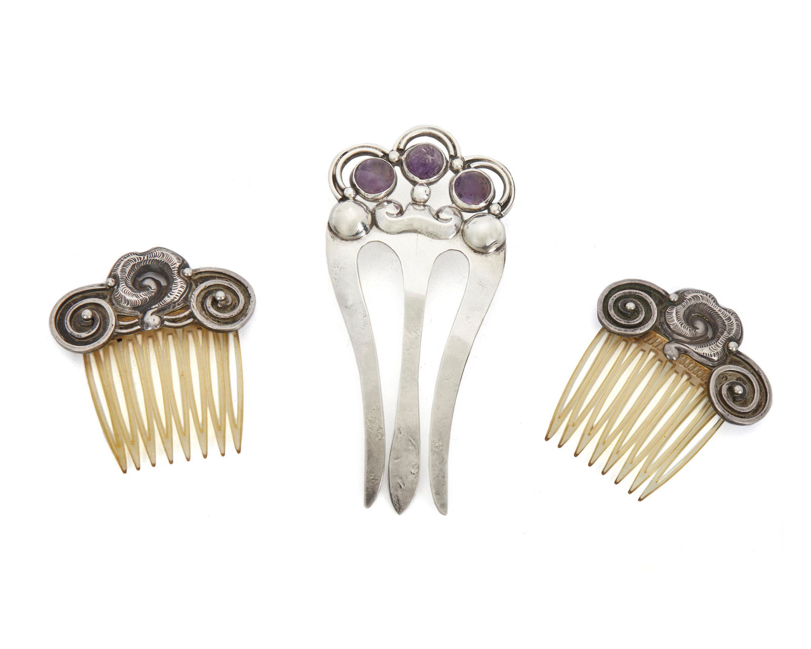 A group of Matl silver hair combs (1 of 2)