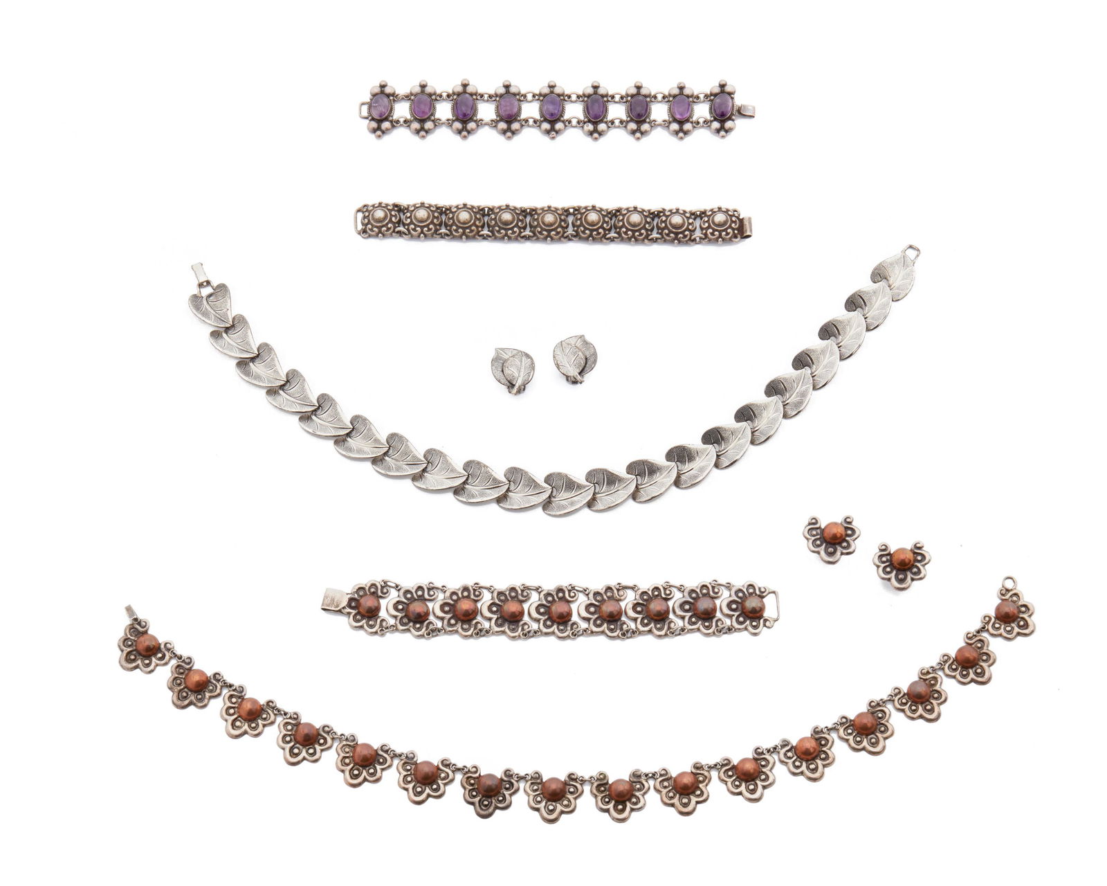 A group of silver jewelry (1 of 2)