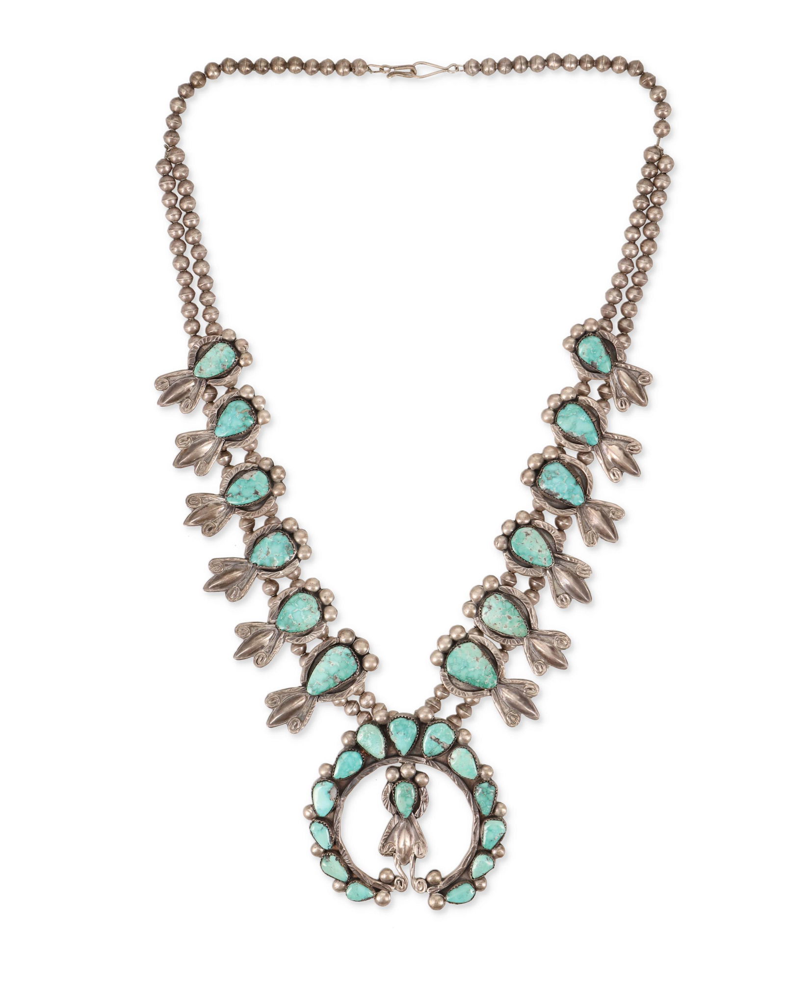 A Navajo/Dine silver and turquoise squash blossom (1 of 2)