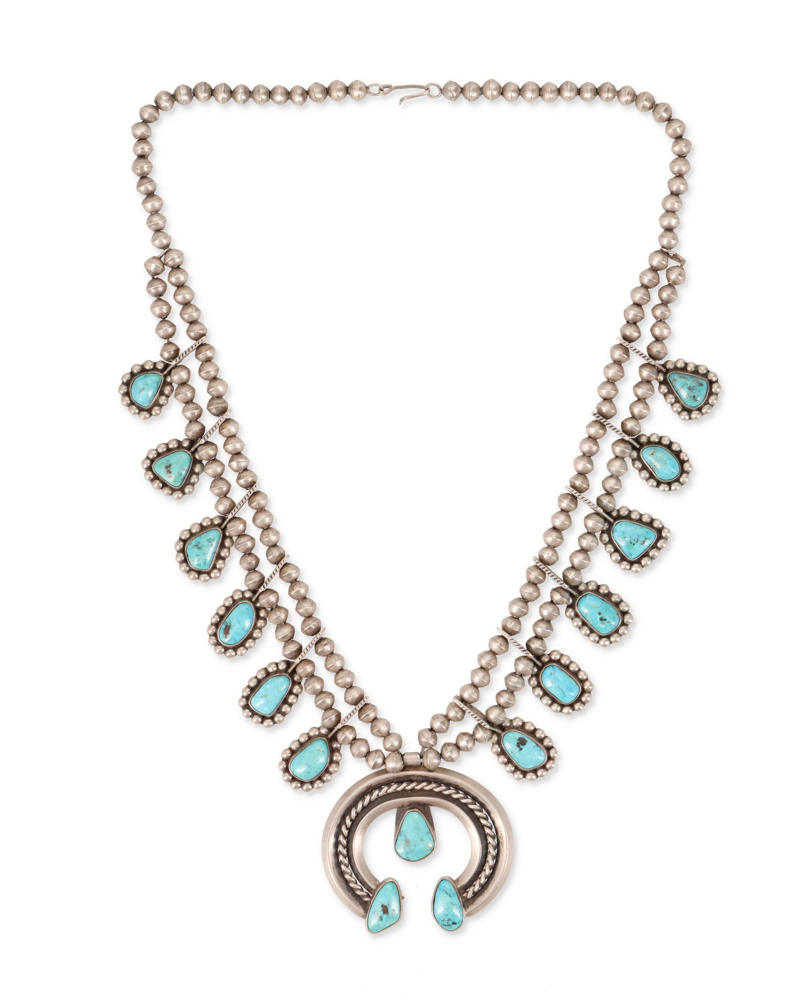 A Navajo/Dine silver and turquoise squash blossom (1 of 2)