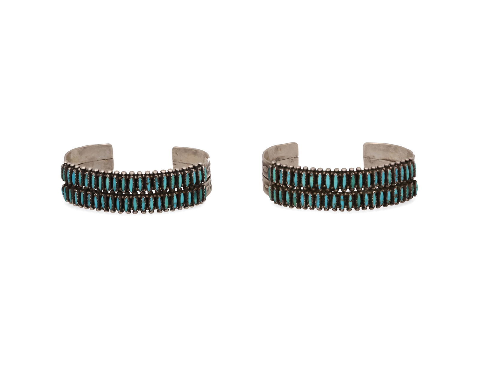 A pair of Zuni needle point cuff bracelets (1 of 2)
