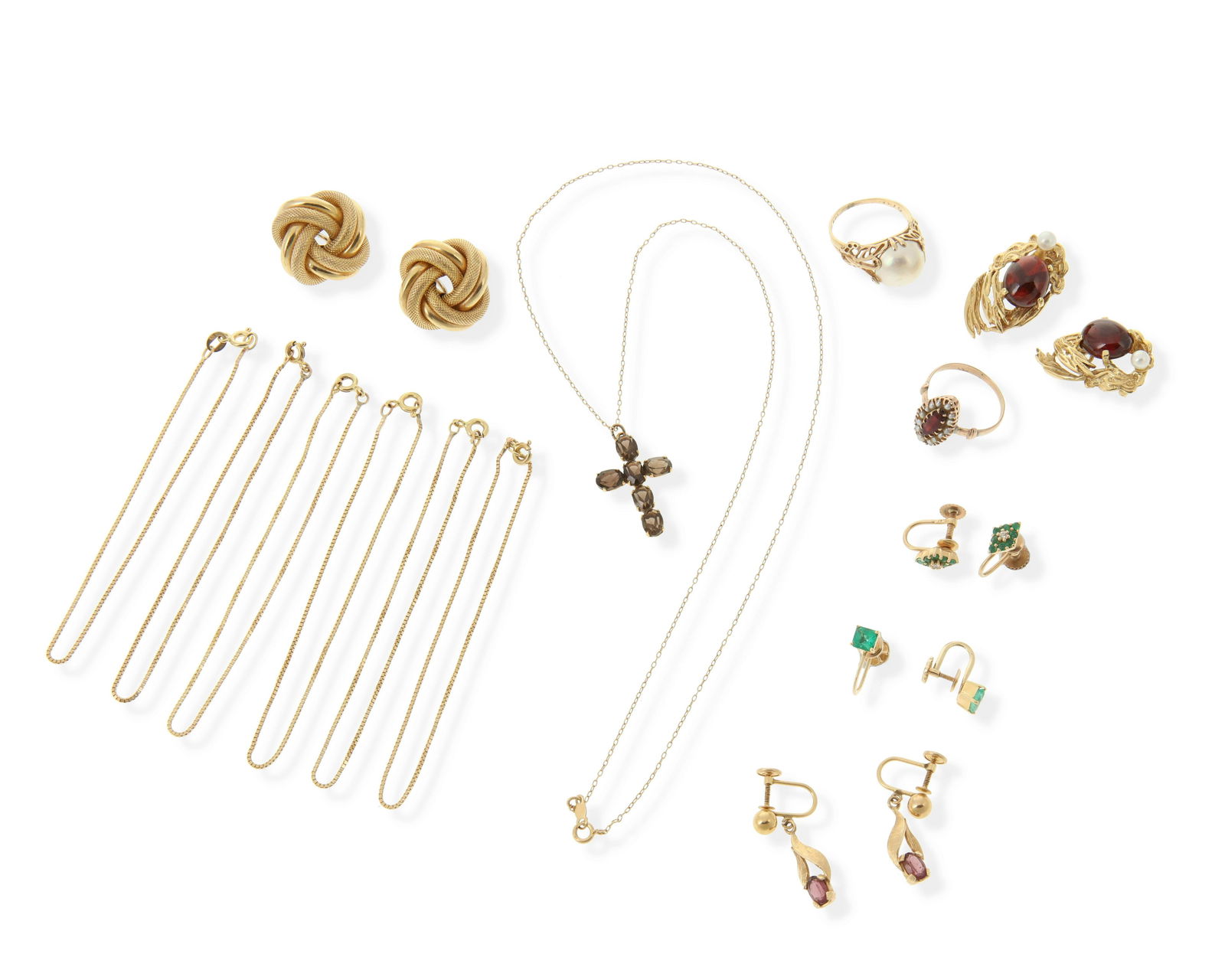 A group of jewelry: 14k yellow gold Comprising a pair of clip-back garnet and cultured pearl earrings, a pair of clip-back knot earrings, three pairs of screw-back gem-set earrings, six gold chain bracelets, a smoky qua
