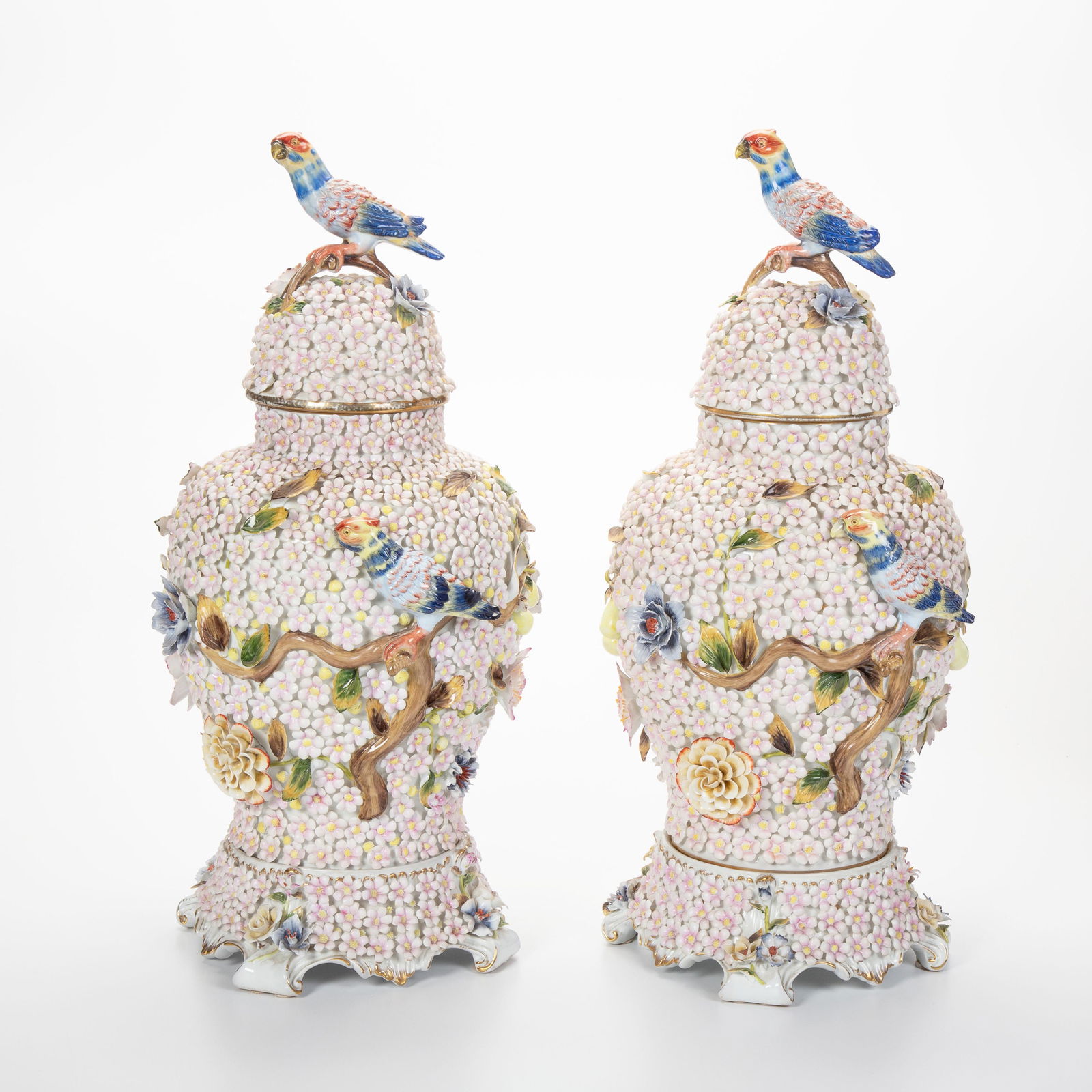 A pair of Dresden relief-decorated porcelain urns (1 of 2)
