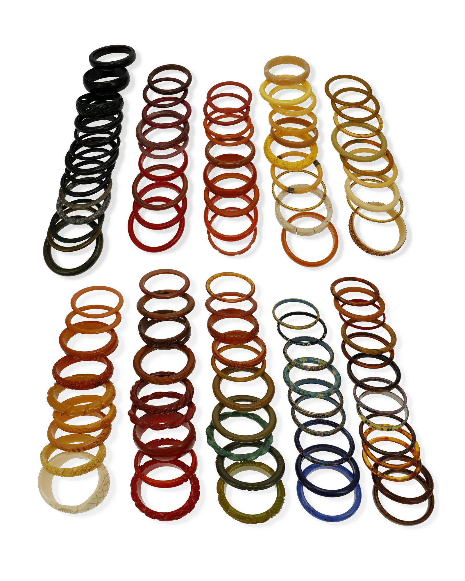 A large group of Bakelite, plastic, and metal bangle (1 of 1)