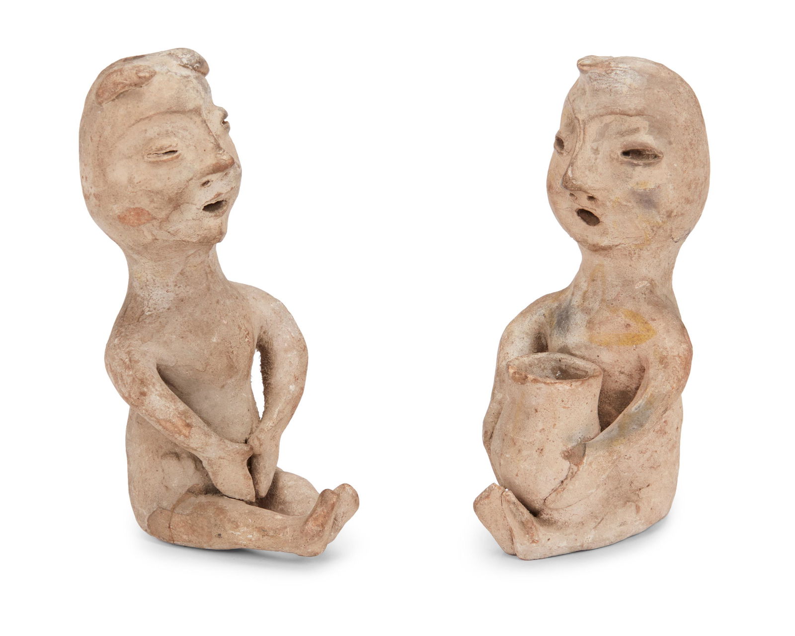 Two hand-formed ceramic Tesuque Rain God figures (1 of 1)