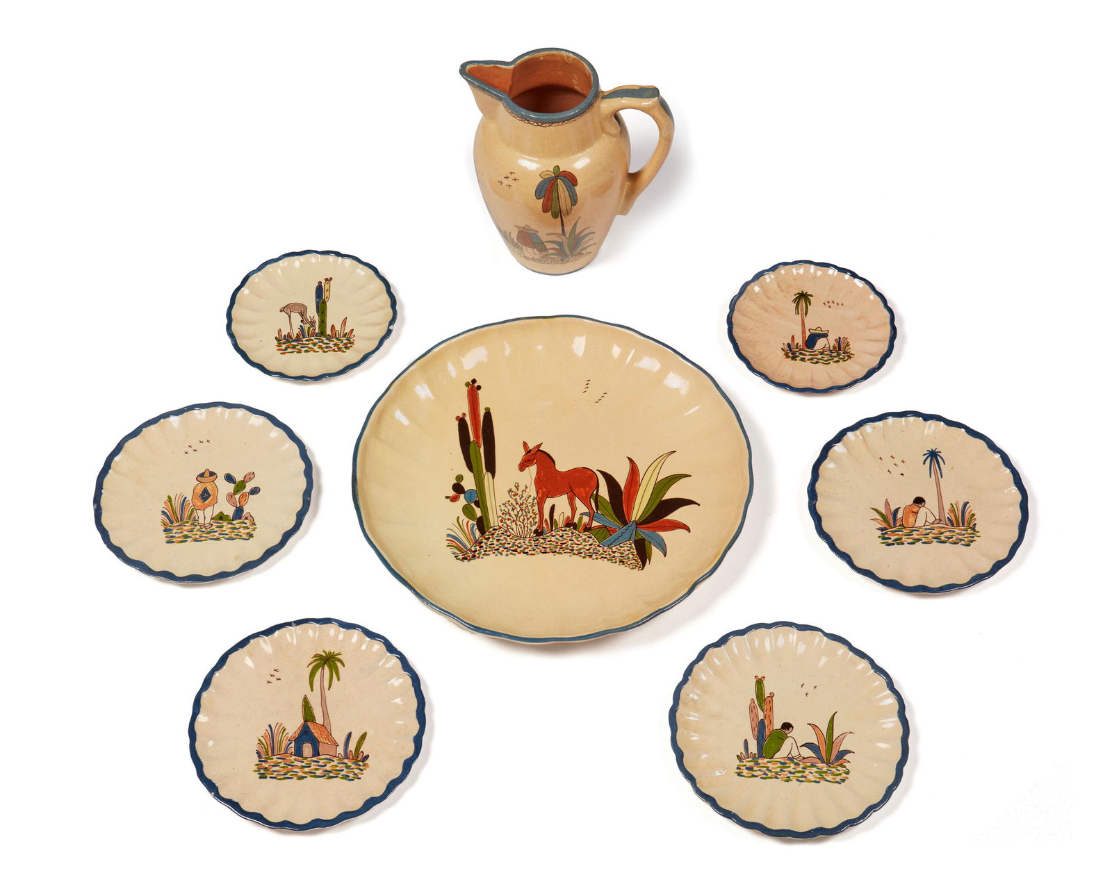 A group of Tlaquepaque pottery serving items (1 of 4)