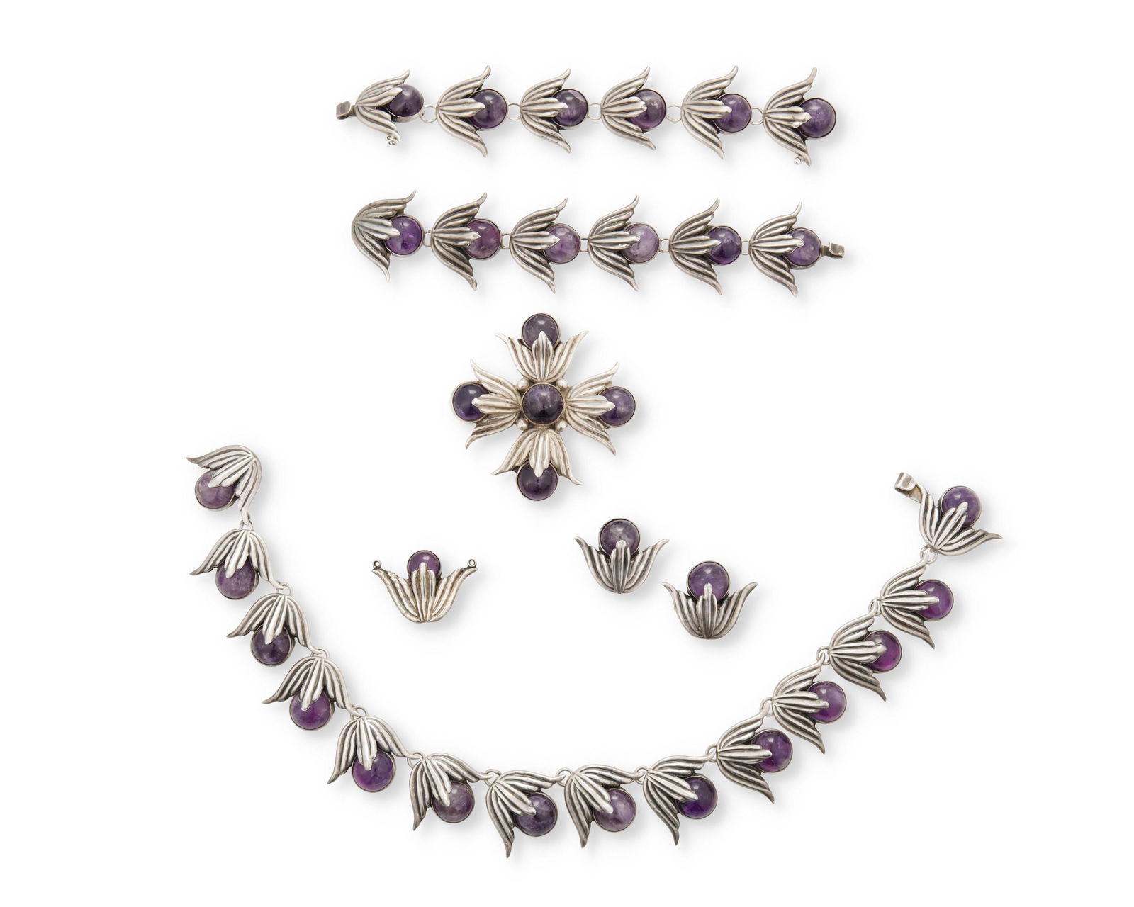 A suite of Hubert Harmon silver and amethyst jewelry: 1944-1948; Mexico Each stamped: Hubert Harmon / Sterling / Made in Mexico; One bracelet and brooch further stamped with winged feet for Hubert Harmon Comprising a link necklace (14" L x 1.25" H); tw