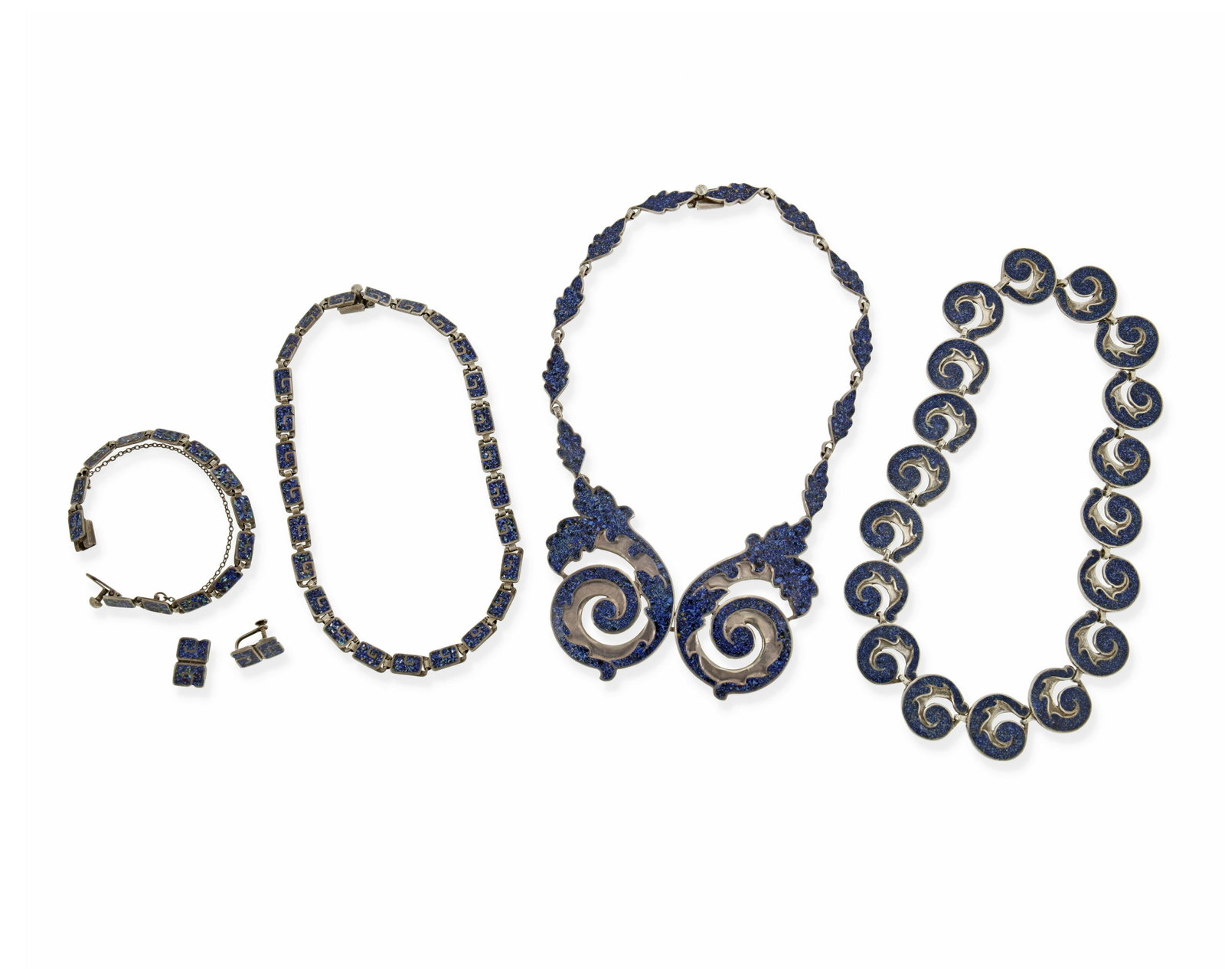 A group of Margot de Taxco silver and enamel jewelry: 1953-1978; Taxco, Mexico Each stamped: Margot de Taxco / Sterling / Made in Mexico / [Eagle 16]; Each further stamped with design number Comprising a stylized foliate blue enamel bib necklace No. 5384