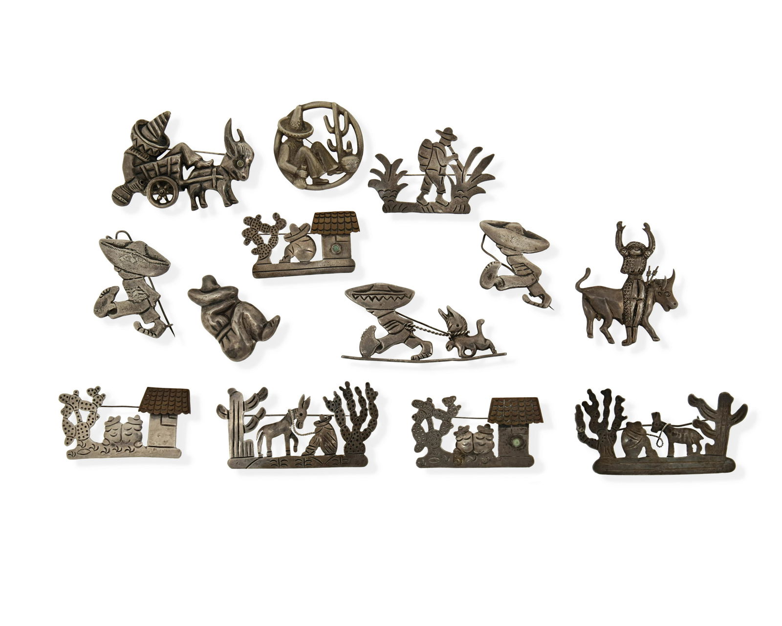 A large group of Mexican silver brooches (1 of 2)