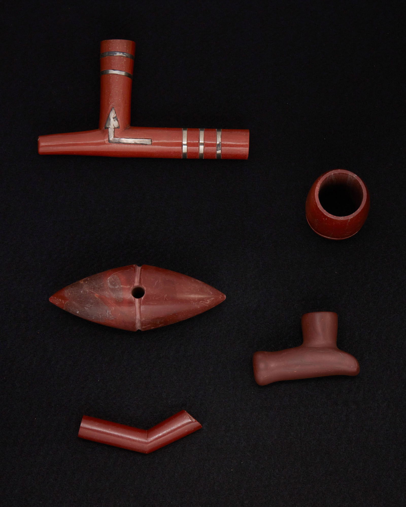 A group of catlinite carved stone items (1 of 2)