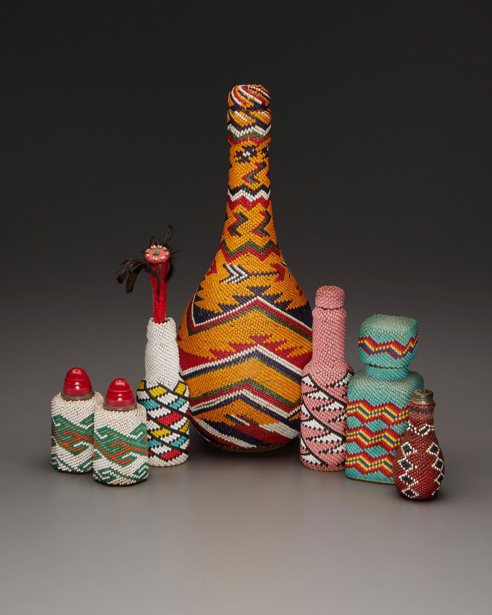 A group of Paiute beaded bottles (1 of 2)
