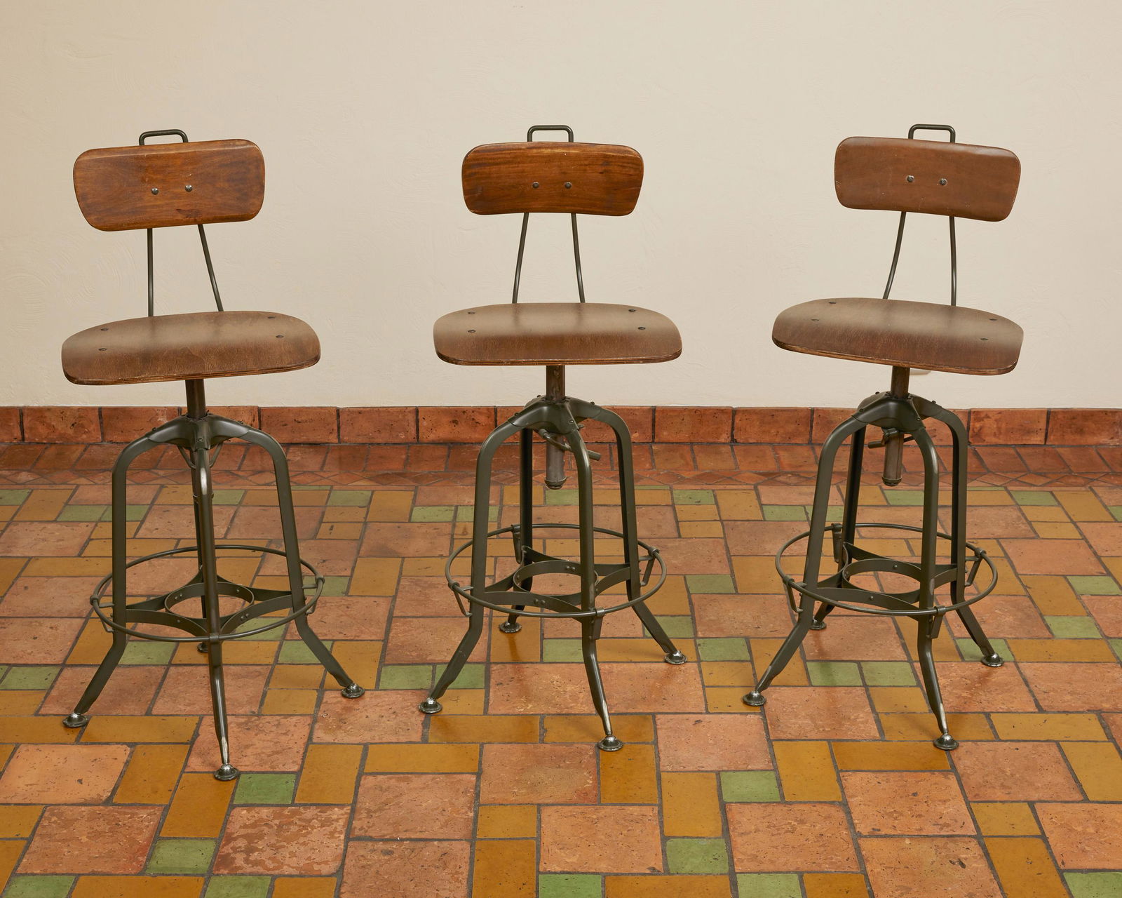 Three contemporary adjustable drafting stools (1 of 3)