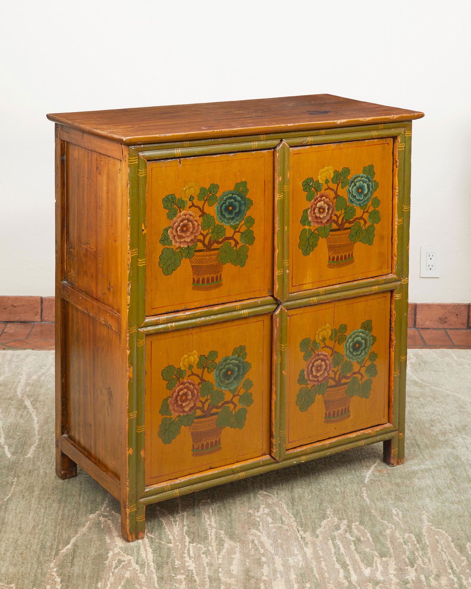 A Chinese-style painted wood cabinet (1 of 2)