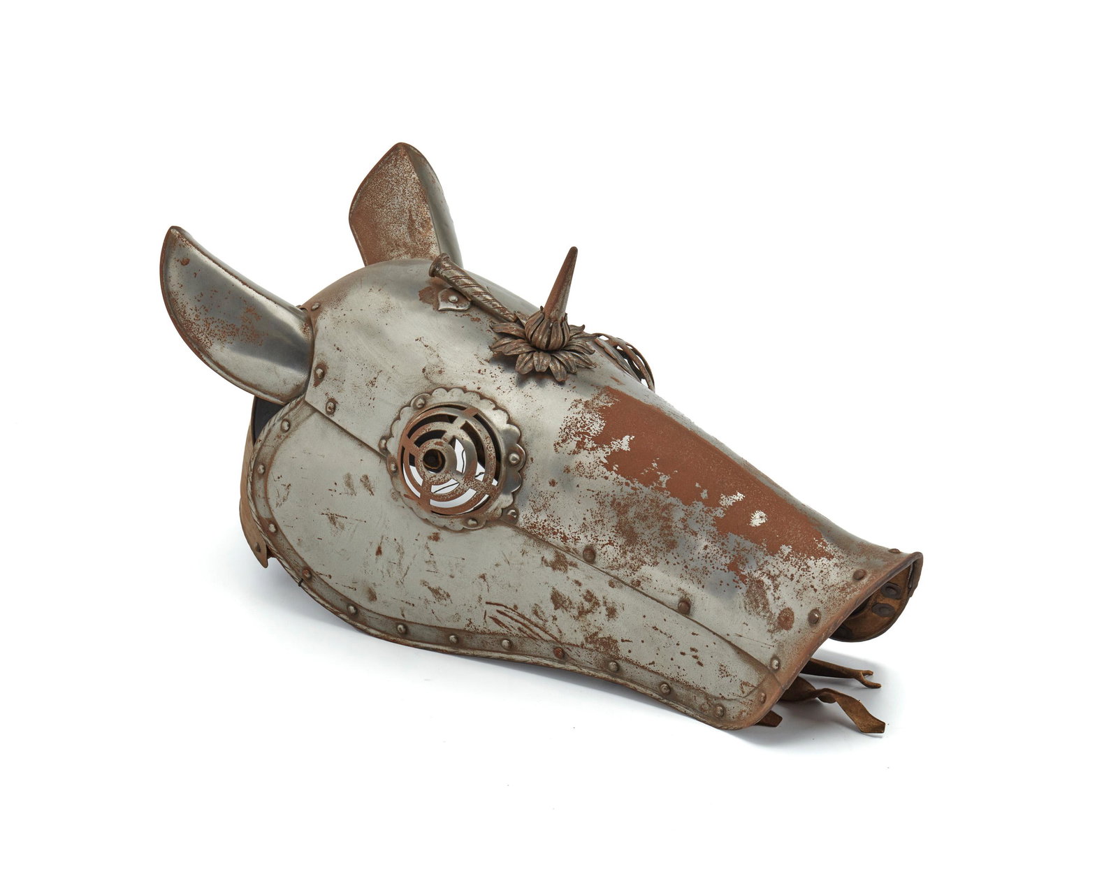 A metal armor-style horse "chanfron" sculpture: Late 20th/Early 21st Century The metal sculpture in the form of a medieval horse's facial armor, or a "chanfron" 24" H x 10.5" W x 13" D