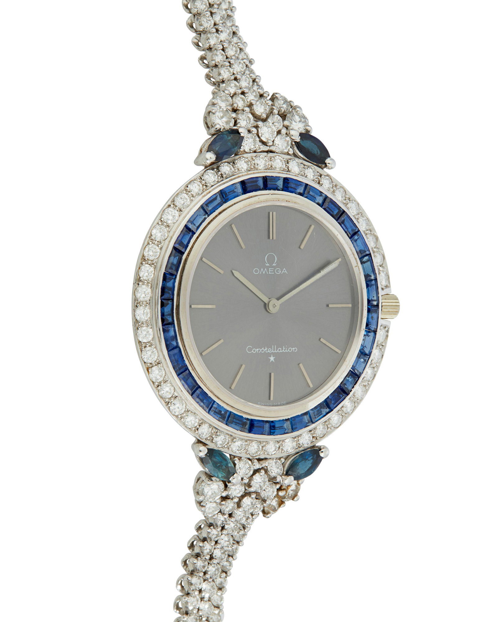 An Omega gold, diamond and sapphire wristwatch (1 of 2)