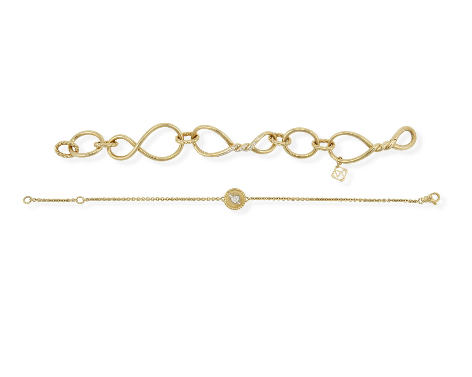 Two David Yurman diamond link bracelets: 18k yellow gold Including a chain link bracelet centering a circular diamond set heart and arrow charm (7.0" L or 7.75" L) and a twisted gold link and diamond set bracelet (7.0" L x 0.625" W), each w