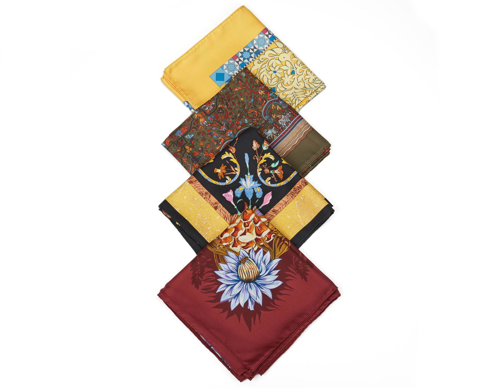 Four Hermes scarves: Late 20th/early 21st Century Four works: "Pierres d'Orientes et d'Occident" Designed by Zoe Pauwels, first issued 1988 Elaborate design of multicolored stone inlay with flowers, fruit, and birds