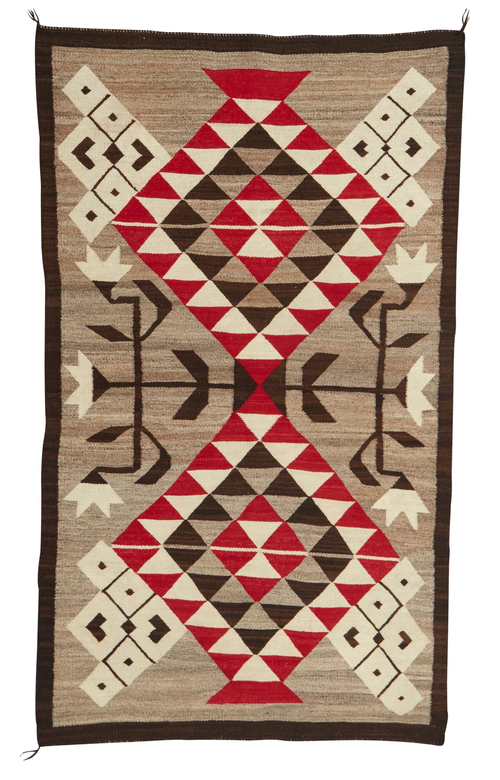 A Navajo pictorial rug: Second-Quarter 20th Centuy; Dine Woven in brown, grey, red and cream wool, with pictorial foliate elements left and right of center 66.5" H x 43" W