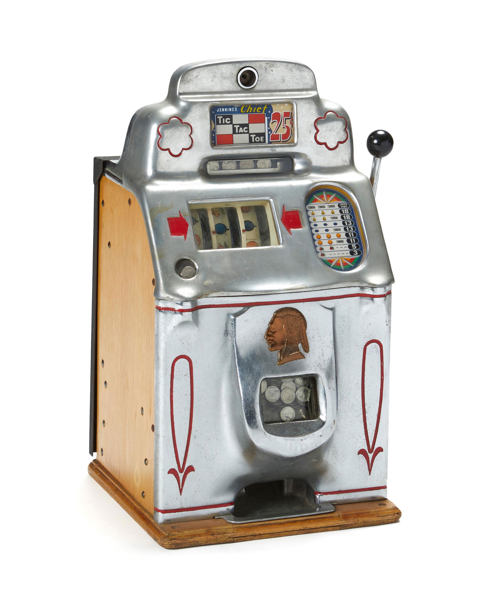 A Jennings Tic-Tac-Toe Chief slot machine: Circa 1951 Metal impressed: U.S.A. Patent Nos. 1659878-1912802 / 1403933-1562771 / 1623945; Wood side with burned number: 166299 By O. D. Jennings & Co., the slot machine with a nickel finished meta