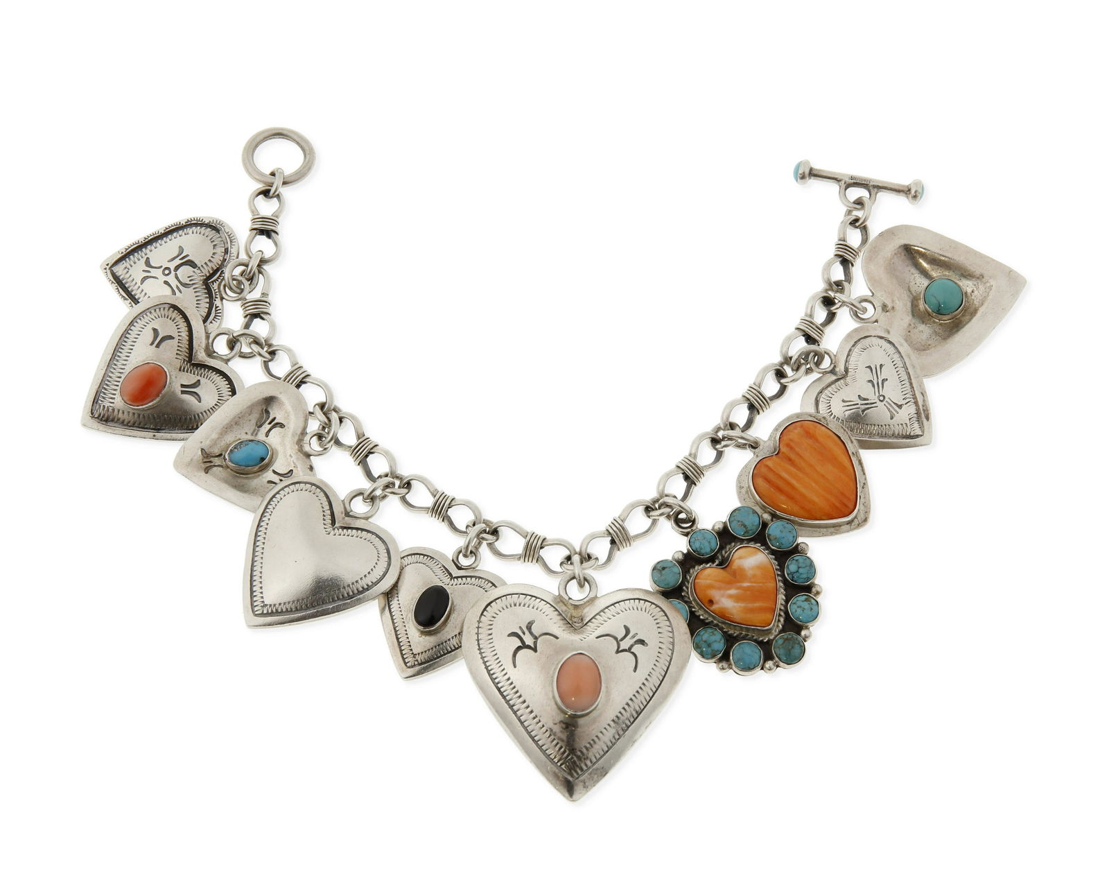 A Southwest-style silver heart charm bracelet (1 of 2)