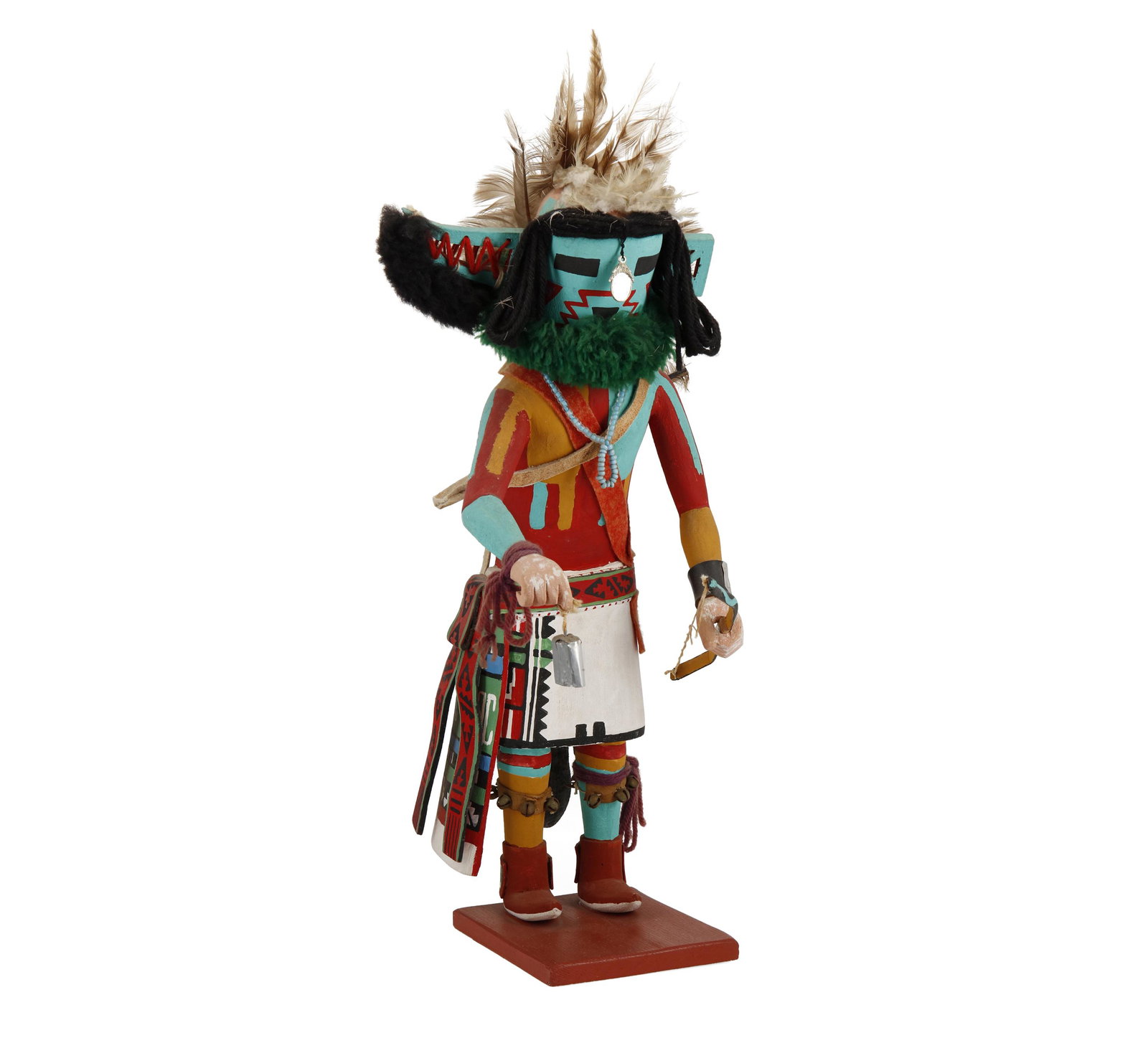 A Zuni Sai Astasana katsina figure: 20th/21st Century Inscribed in pencil to underside: By Harold Sahu The Sai Astasana, Rain Priest of the North, or Longhorn, katsina figure in carved and polychromed cottonwood with feathers, yarn, met