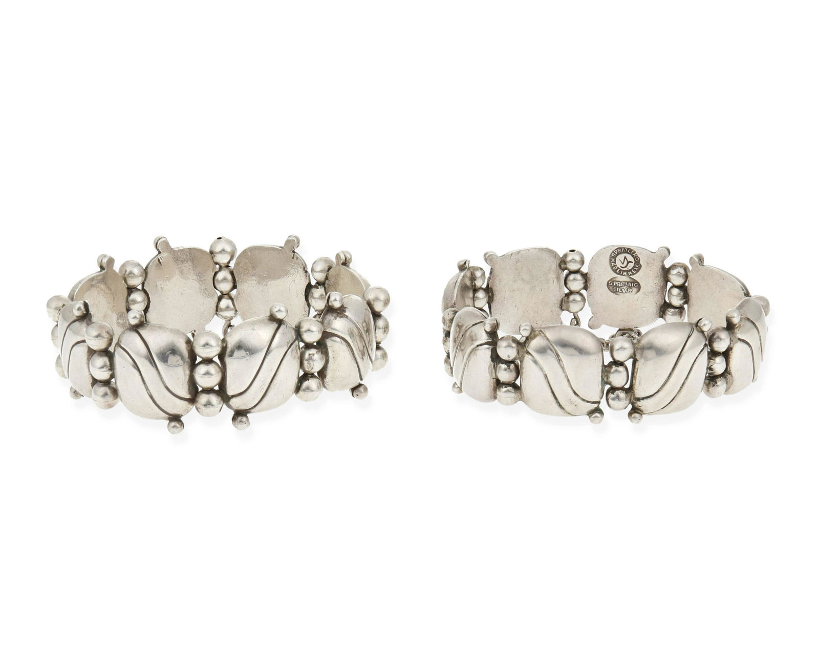 William Spratling (1900-1967, American): A pair of silver link bracelets, circa 1940-1946, First Design Period; Taxco, Mexico Each stamped for William Spratling; Further stamped: Made in Mexico / Silver Comprising two square link bracelets