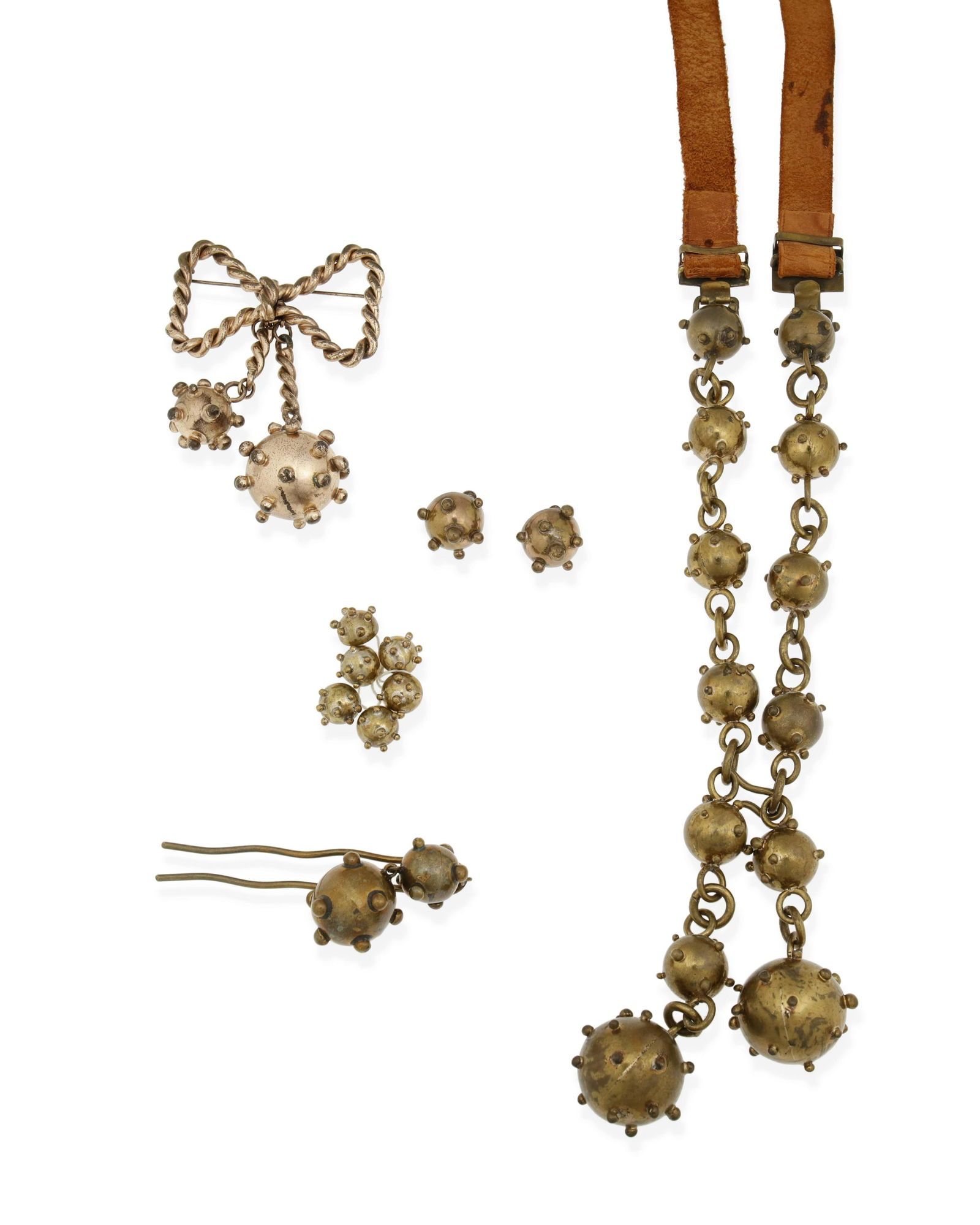 Hubert Harmon (1913-2004, American): A group of brass "Sputnik" design jewelry, circa 1942-1948; Taxco, Mexico Four works stamped: Hubert Harmon / Mexico; Belt stamped with elephant pictograph mark; Further stamped: Jorille [?] / Made i