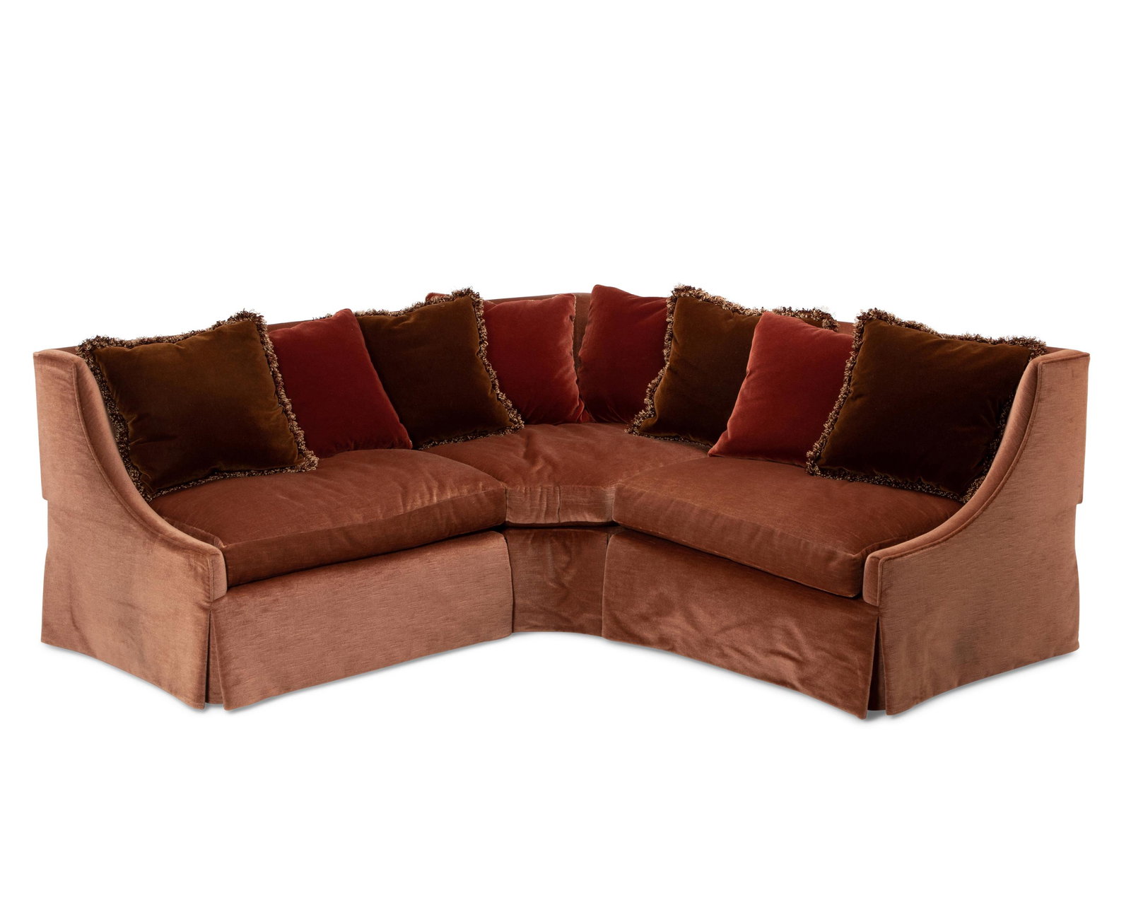 A custom banquette sofa: Late 20th/Early 21sy Century The modular-style sofa with a left and a right facing side, in rust-toned mohair-style upholstery, together with eight variously designed pillows, 11 pieces Center: 35" H 