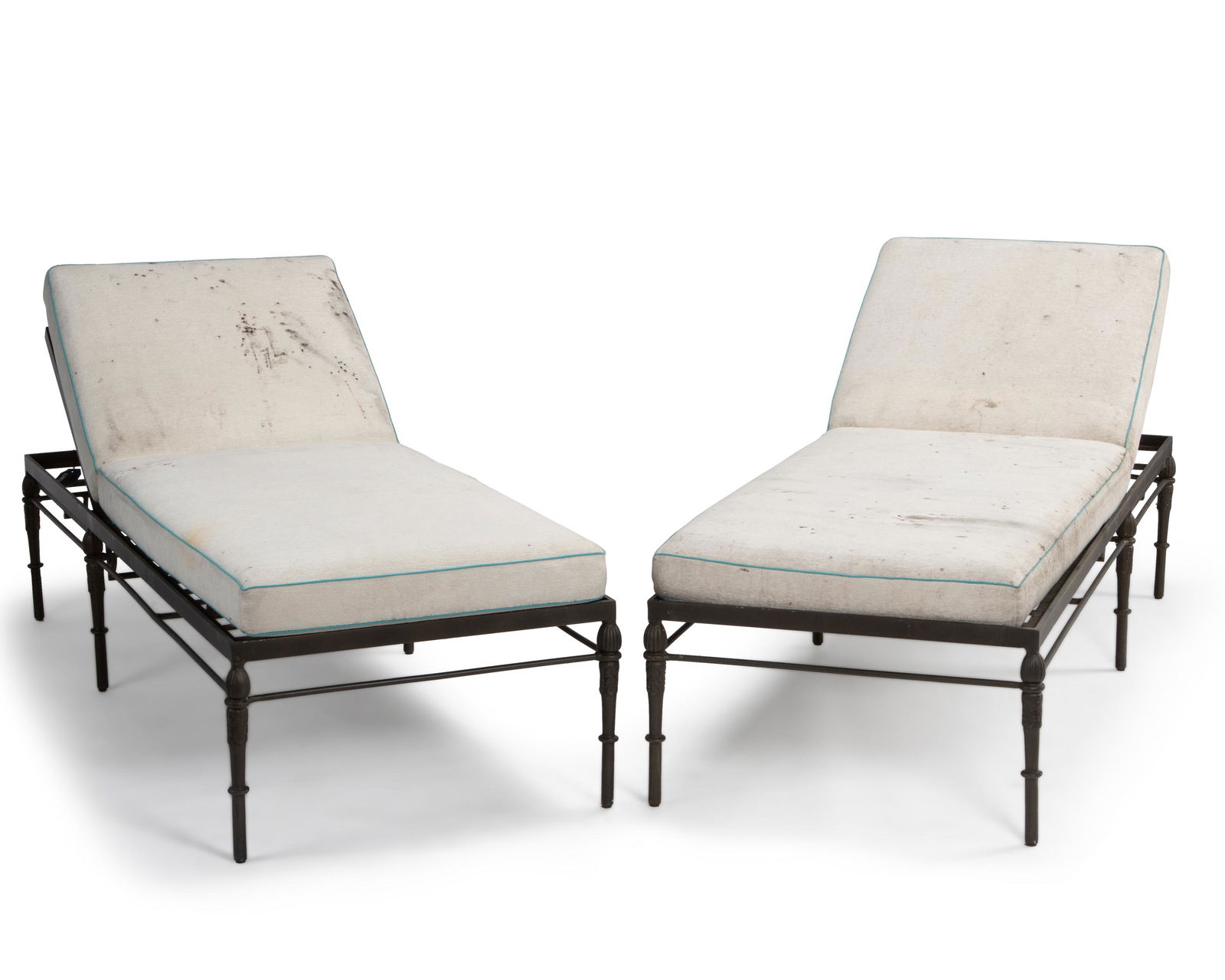 Two Michael Taylor "Montecito" outdoor garden chaise longues chairs: Late 20th/Early 21st Century Each patinated aluminum lounge chair with cream chenille upholstered cushions with aqua piping, 2 pieces Each: 21" H x 31" W x 79" D (at flattest position) Provenance: