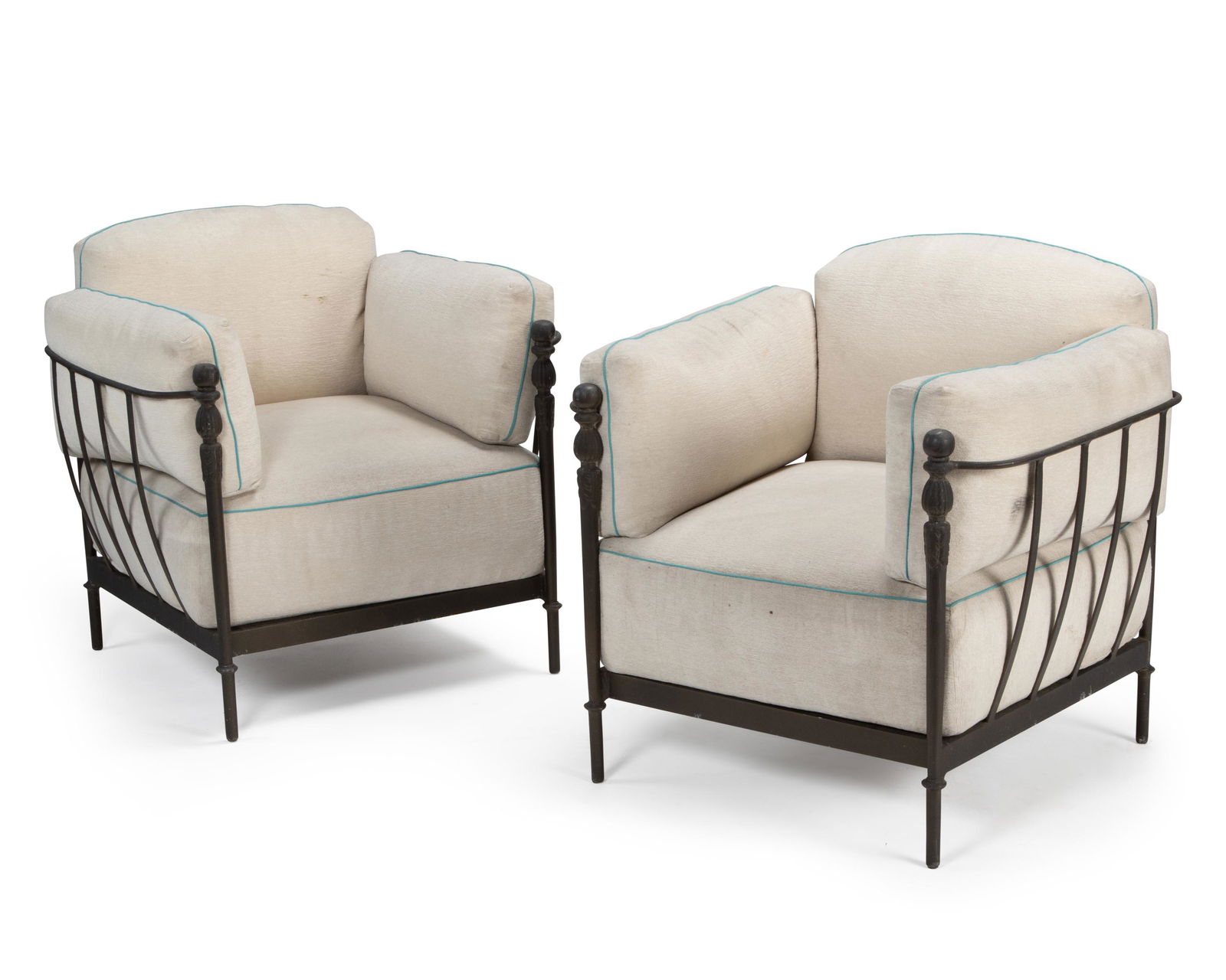 Two Michael Taylor "Montecito" outdoor garden armchairs: Late 20th/Early 21st Century Each patinated aluminum armchair with cream chenille upholstered cushions with aqua piping, 2 pieces Each: 37" H x 38" W x 37" D Provenance: The Residential Property o