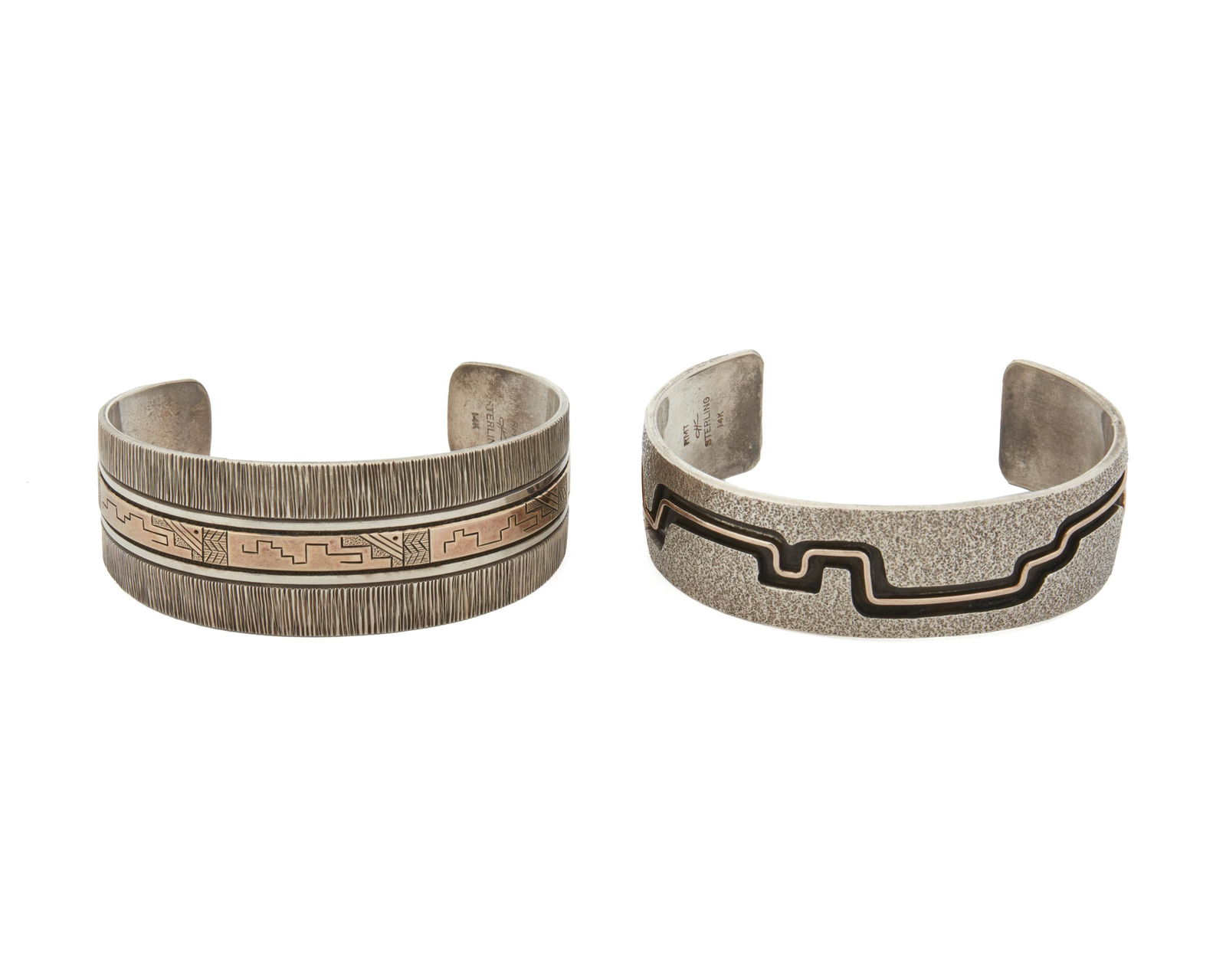 Roderick & Marilyn Tenorio (1955-2015, & b. 20th Century, Kewa Pueblo): A pair of Pueblo silver and 14K gold cuff bracelets Each stamped: RMT / [cipher] / Sterling / 14K Two sterling silver and gold cuffs including one with a shadowbox gold mesa outline motif, and one w