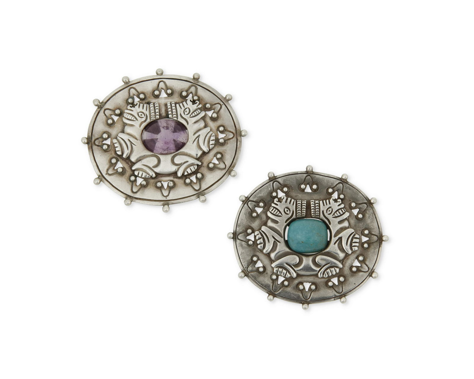 A pair of William Spratling silver and gem-set brooches (1 of 2)