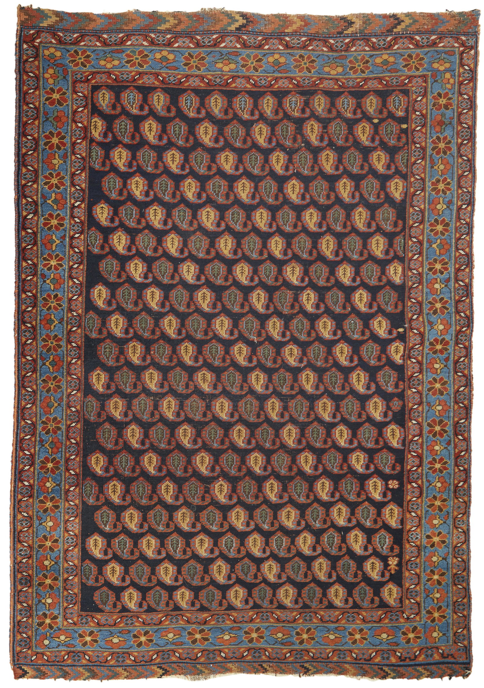 A Persian area rug: Early 20th century Wool on wool foundation, with polychrome boteh motif 5'6" L x 3'9" W