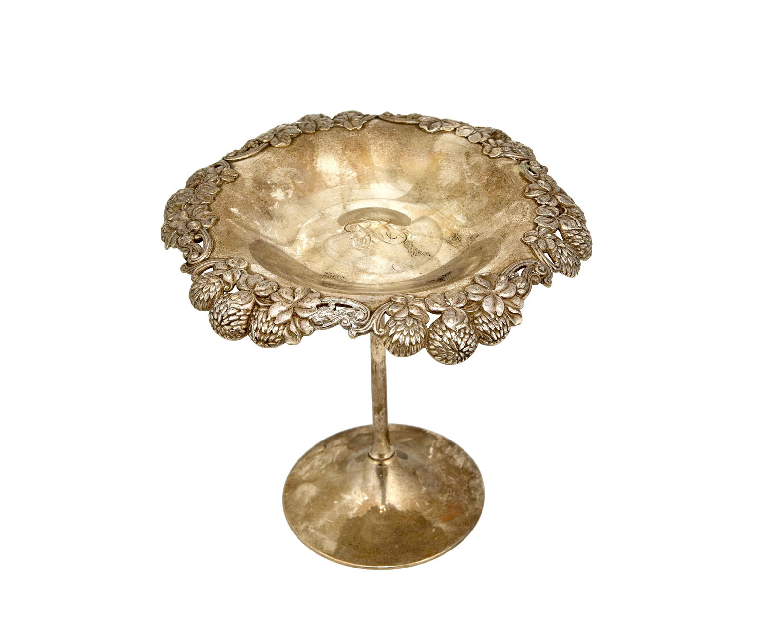 A Tiffany & Co. sterling silver tazza: Circa 1902-1907, directorship of Charles T. Cook Marked: Tiffany & Co. / 16073 Makers 2661 / Sterling Silver / 925-1000 / C With a clover flower rim 6.25" H x 6.75" Dia. 11.985 oz. troy approximately