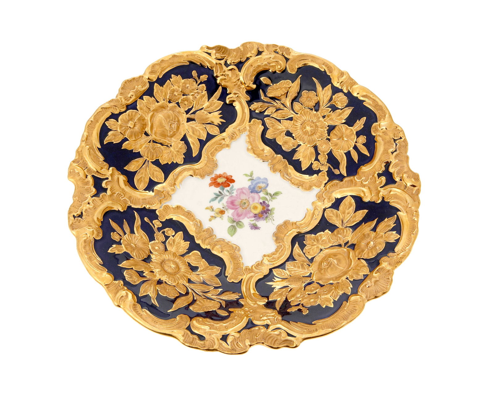 A Meissen gold and enameled porcelain cabinet plate: Circa 1934-1945 Marked for Meissen: [blue crossed swords] / Z985 / 332980 / 331 With cobalt enameling and handpainted floral spray in the center of the dish 2" H x 11" Dia.