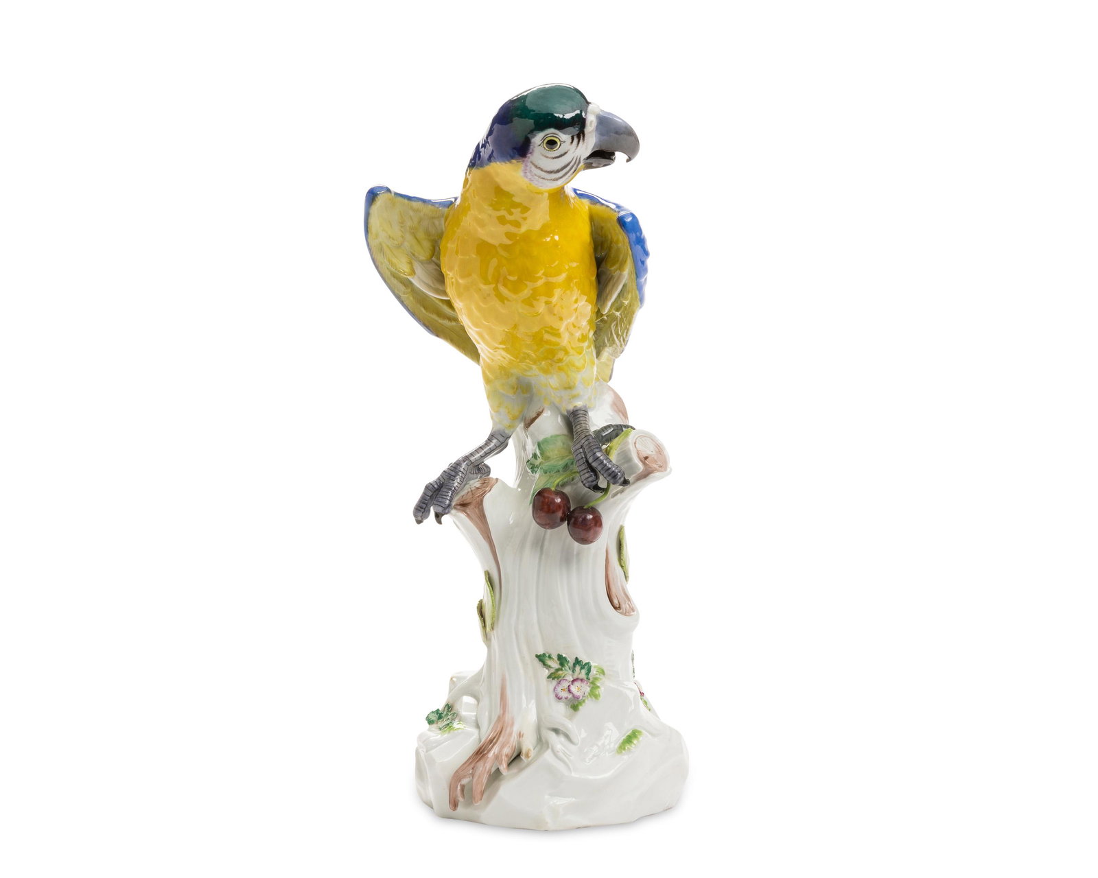 A Meissen porcelain parrot figure: Circa 1947-73 Marked for Meissen [blue crossed swords]; impressed: A43a Model A43a, designed by Johann Joachim Kandler (1706-1775) in 1765, the glazed porcelain parrot with blue and yellow feathers on