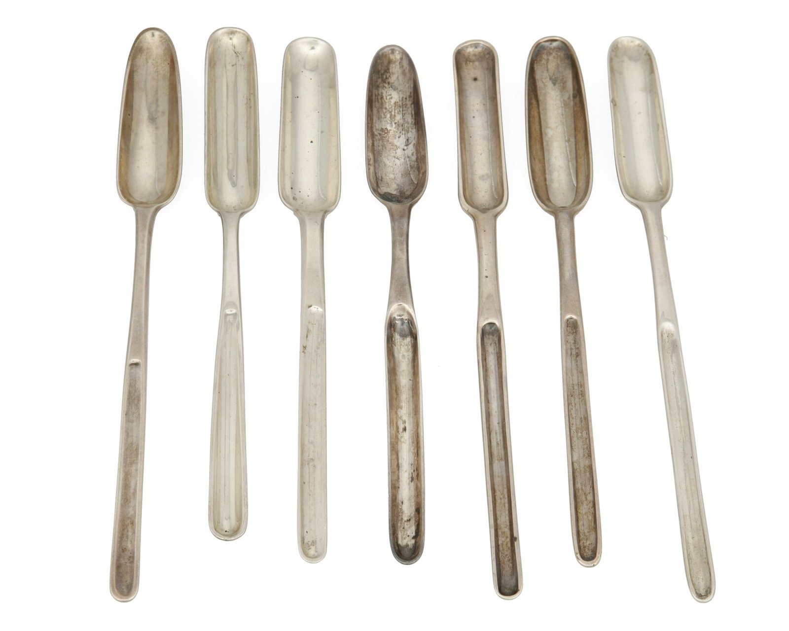A group of English and Irish sterling silver marrow spoons: 19th century Each marked with hallmarks for England or Ireland; various maker's marks Comprising marrow spoons in various forms, 7 pieces Largest: 9" L 10.01 oz. troy approximately Provenance: The Est