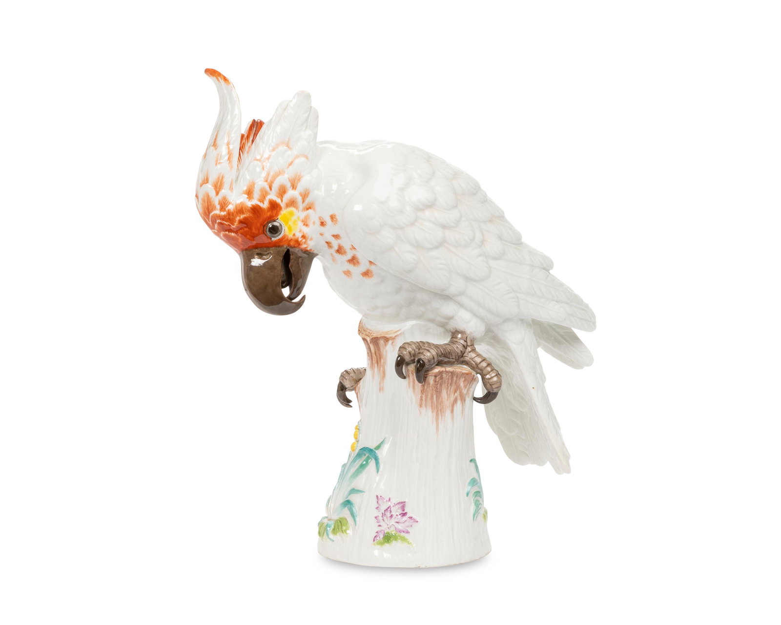 A Meissen porcelain cockatoo figure: Circa 1924-34 Marked for Meissen [blue crossed swords]; inscribed: 1778X; impressed: 85 Model 1778, designed by Johann Joachim Kandler (1706-1775) in 1734, the glazed porcelain cockatoo with white and