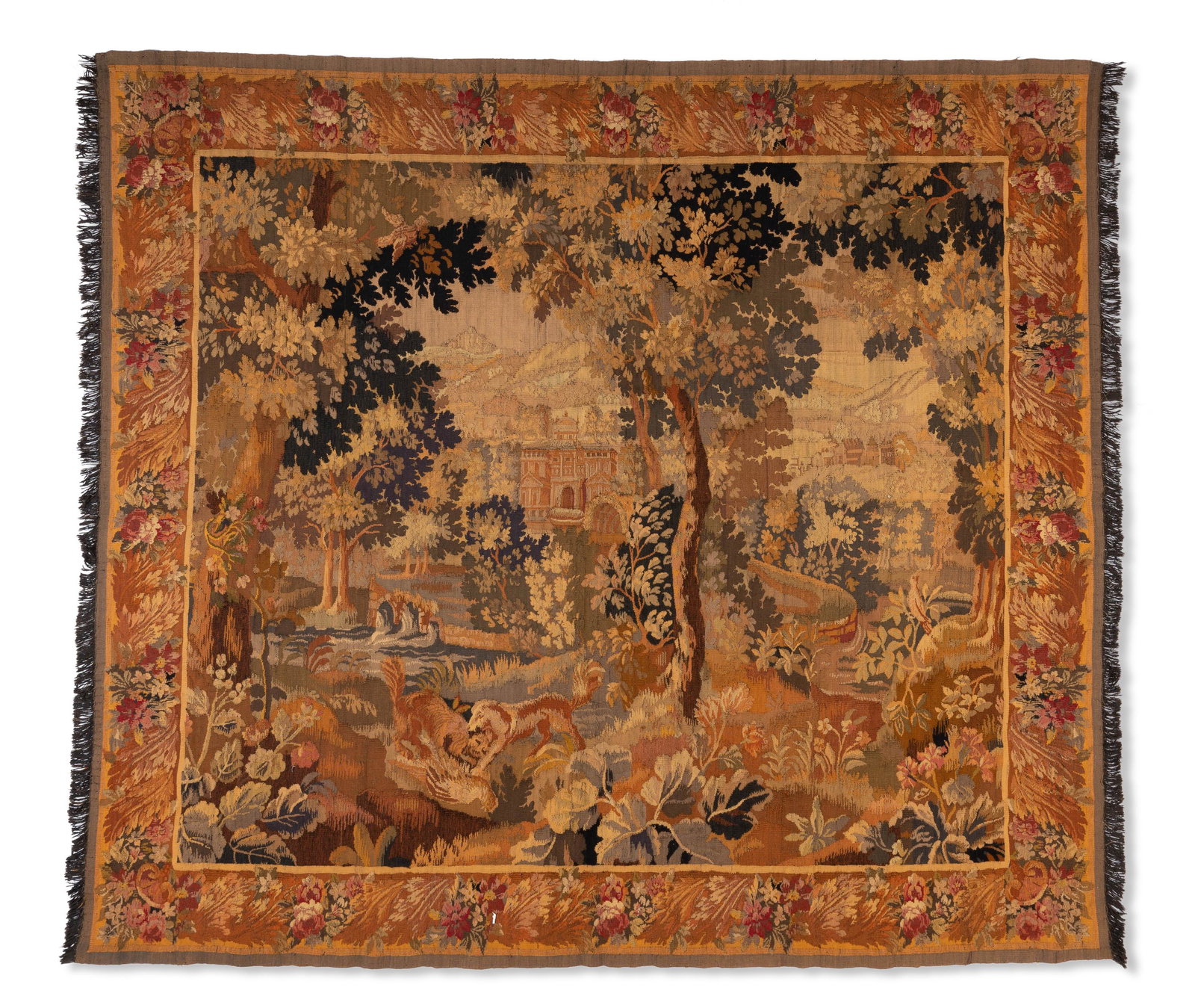 A French woven wool tapestry: Late 19th/early 20th century Depicting animals in a landscape with a floral border; wool on wool foundation 8' 3" L x 7' 4" W