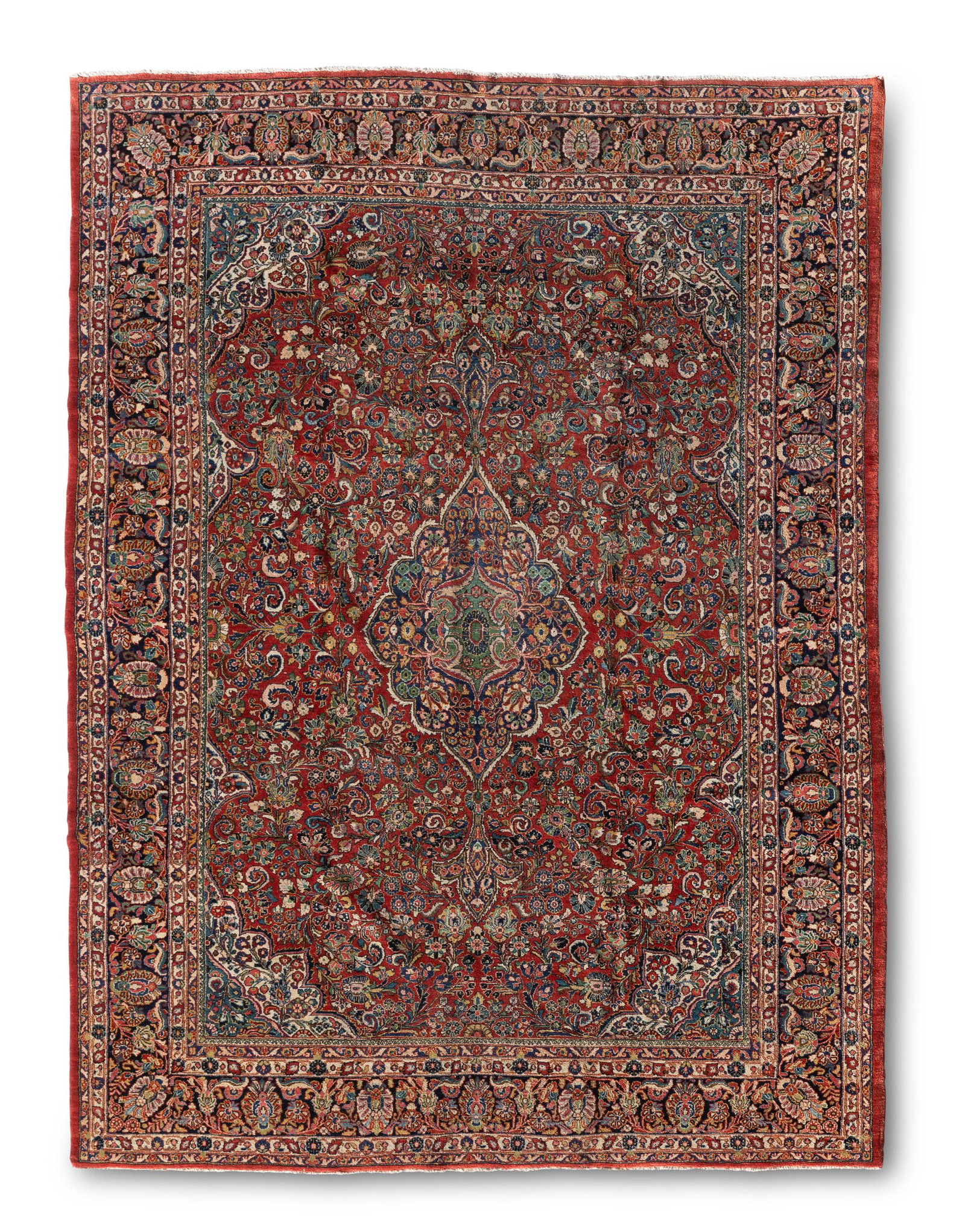 A Persian Sarouk area rug: Circa 1940s; Iran Wool on cotton foundation with red wine color foundation with all over floral sprays and central medallion 13'4" L x 9'11" W