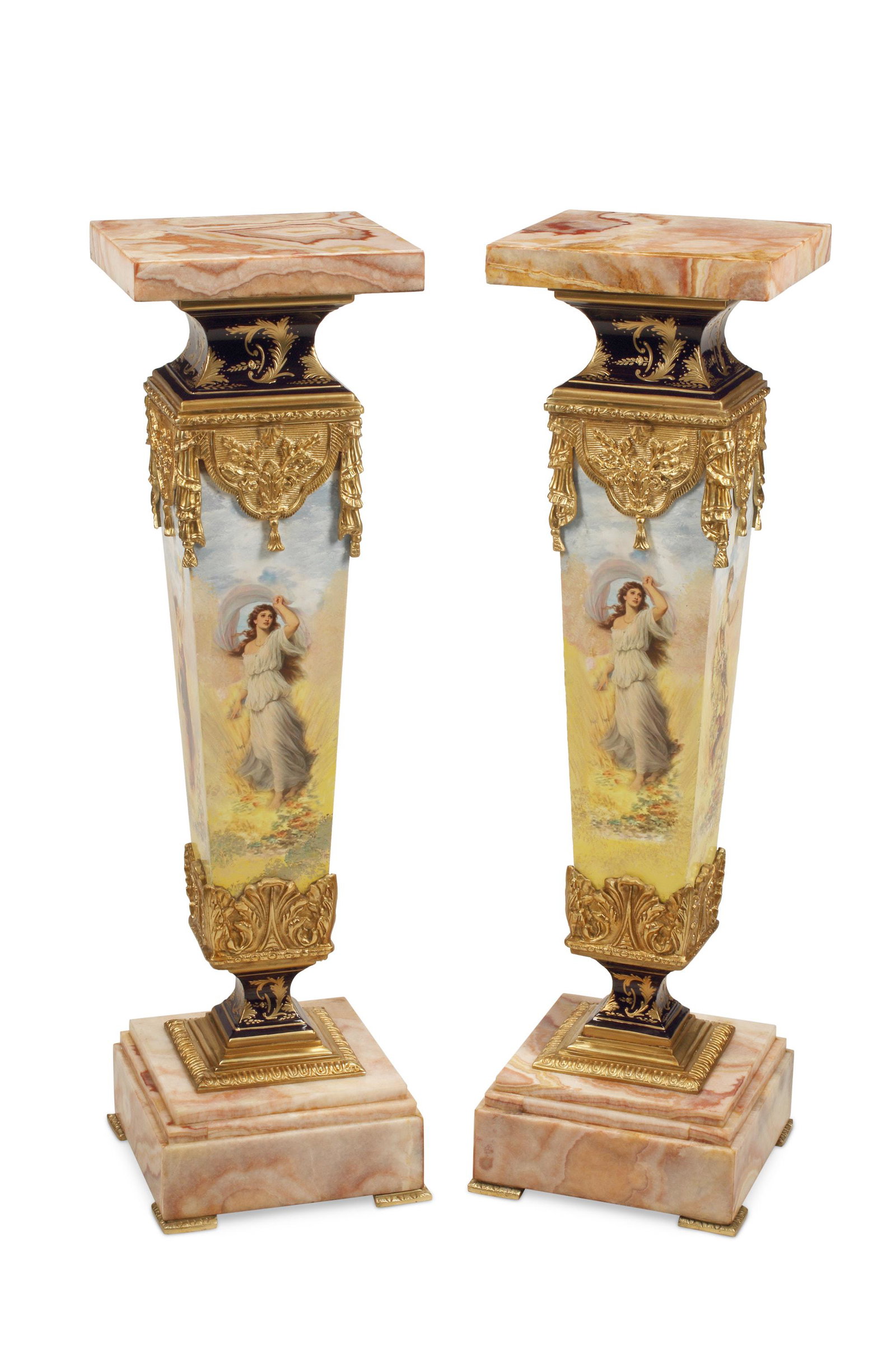 A pair of French onyx and porcelain pedestals: 20th century Each with gilt-bronze mounts, 2 pieces Each: 48" H x 14" L x 14" D